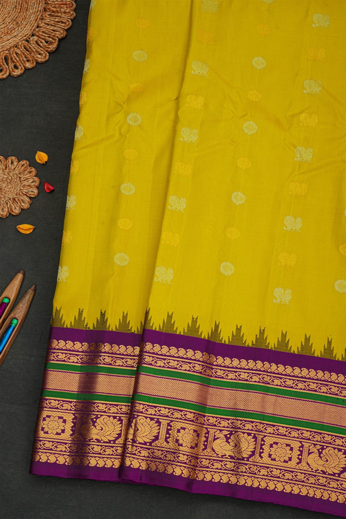 Gadwal Silk Yellow Saree With Peacock And Floral Buttis Body