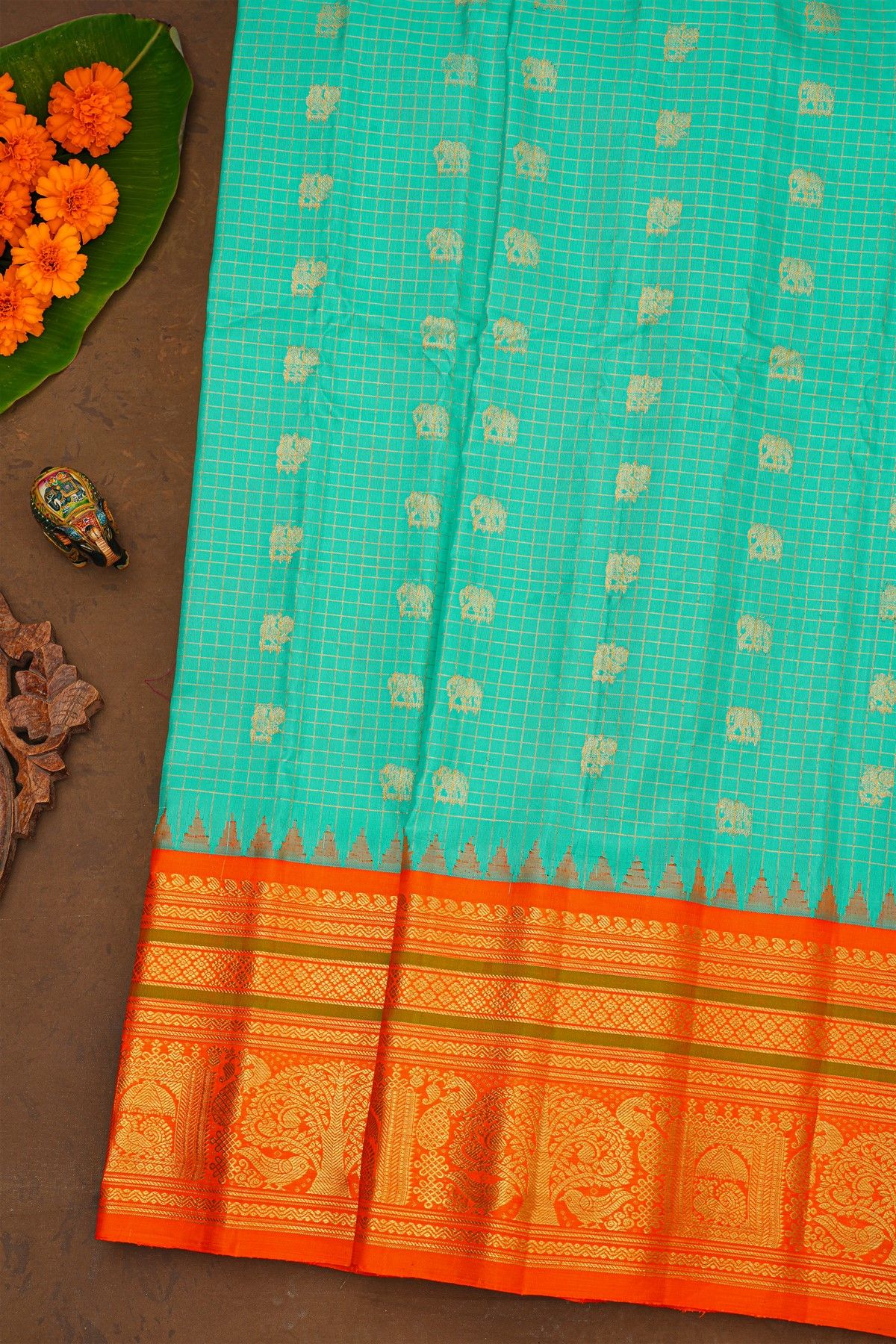 Gadwal Silk Sea Green Saree With Elephant Buttis Body