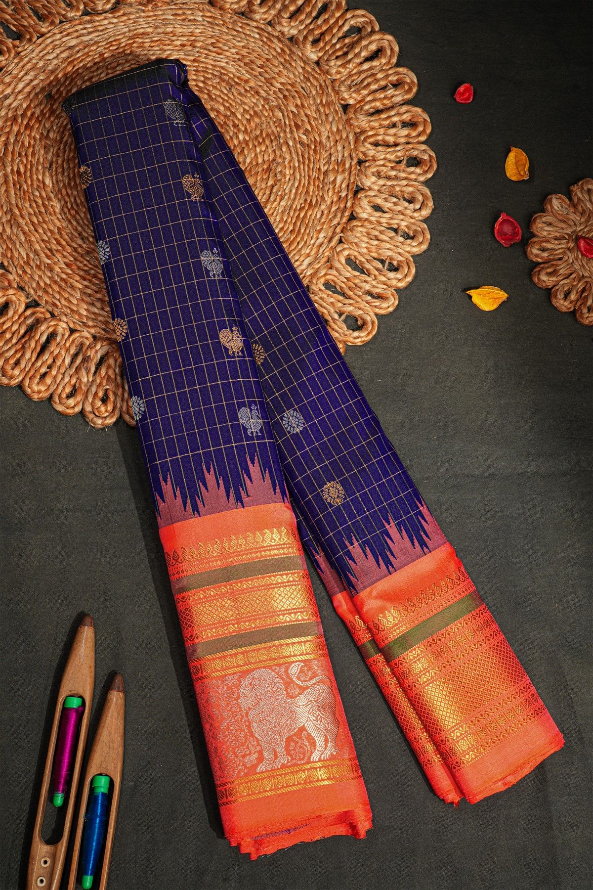 Gadwal Silk Navy Blue Saree With Florals And Animal Border