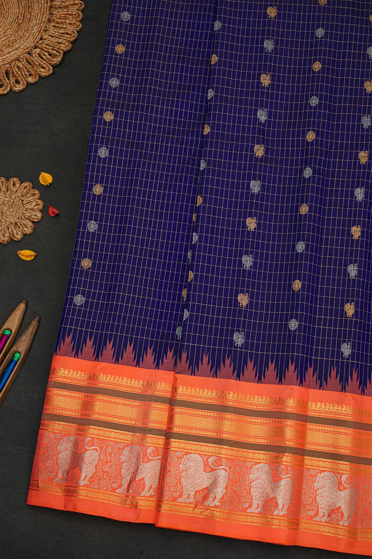 Gadwal Silk Navy Blue Saree With Florals And Animal Border