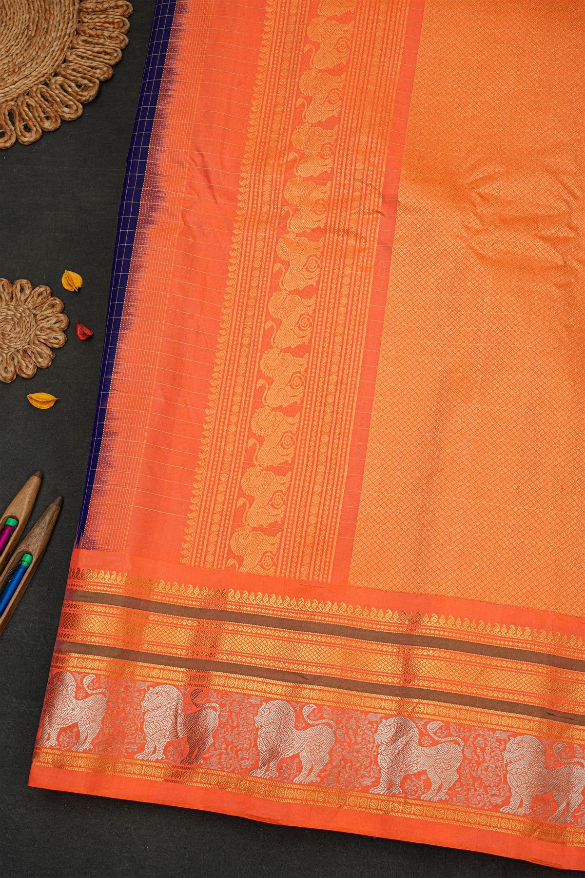 Gadwal Silk Navy Blue Saree With Florals And Animal Border