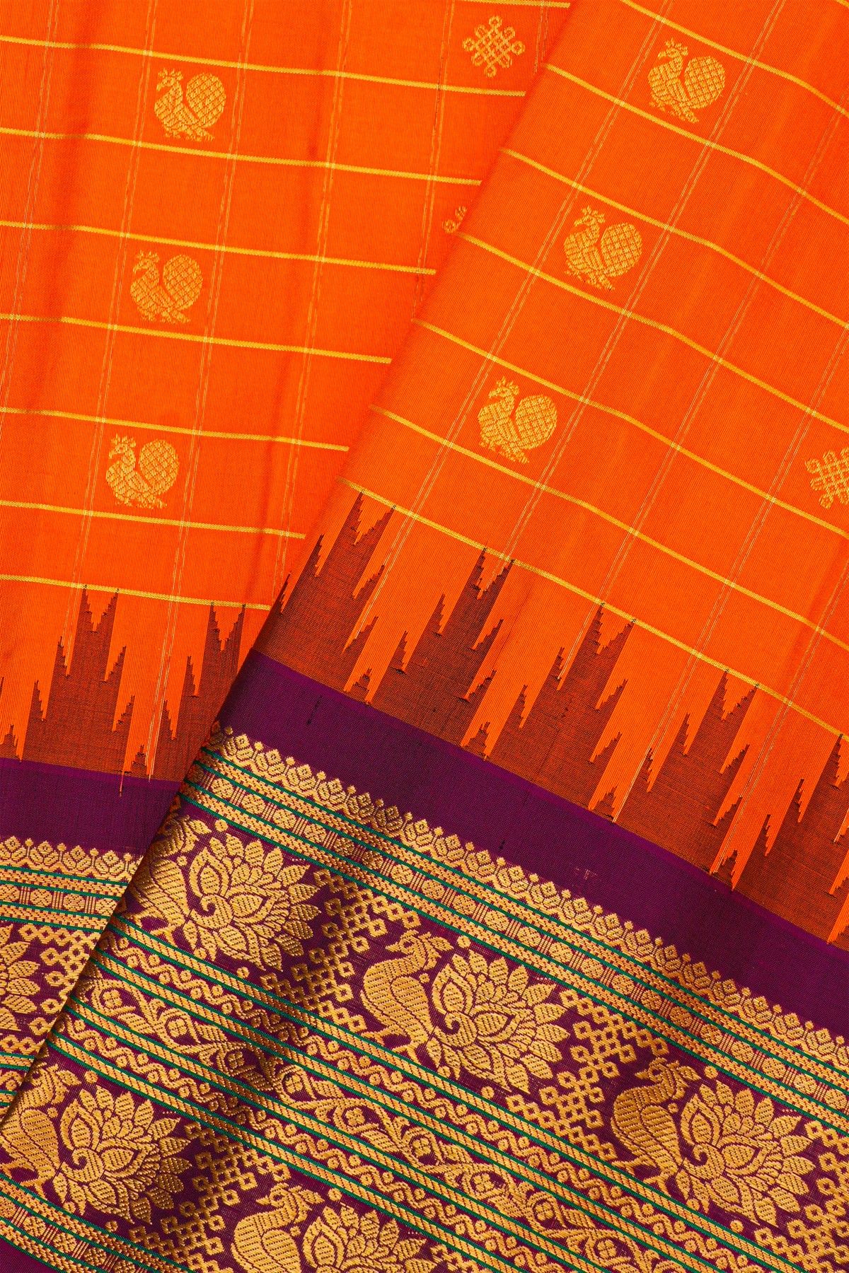 Gadwal Silk Orange Saree With Florals And Peacocks Border