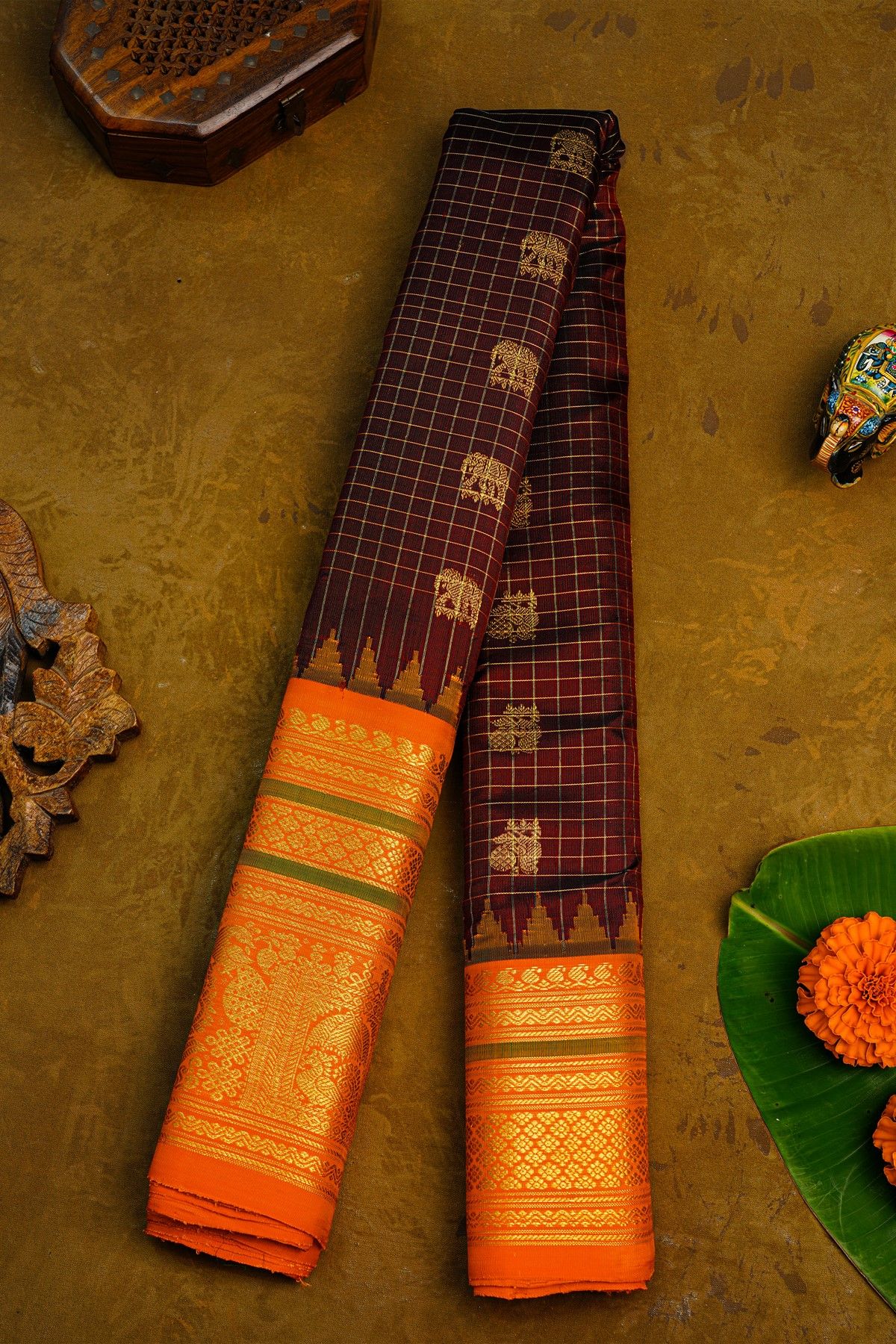 Gadwal Silk Maroon Saree With Elephants And Peacocks Buttis In Checks Body