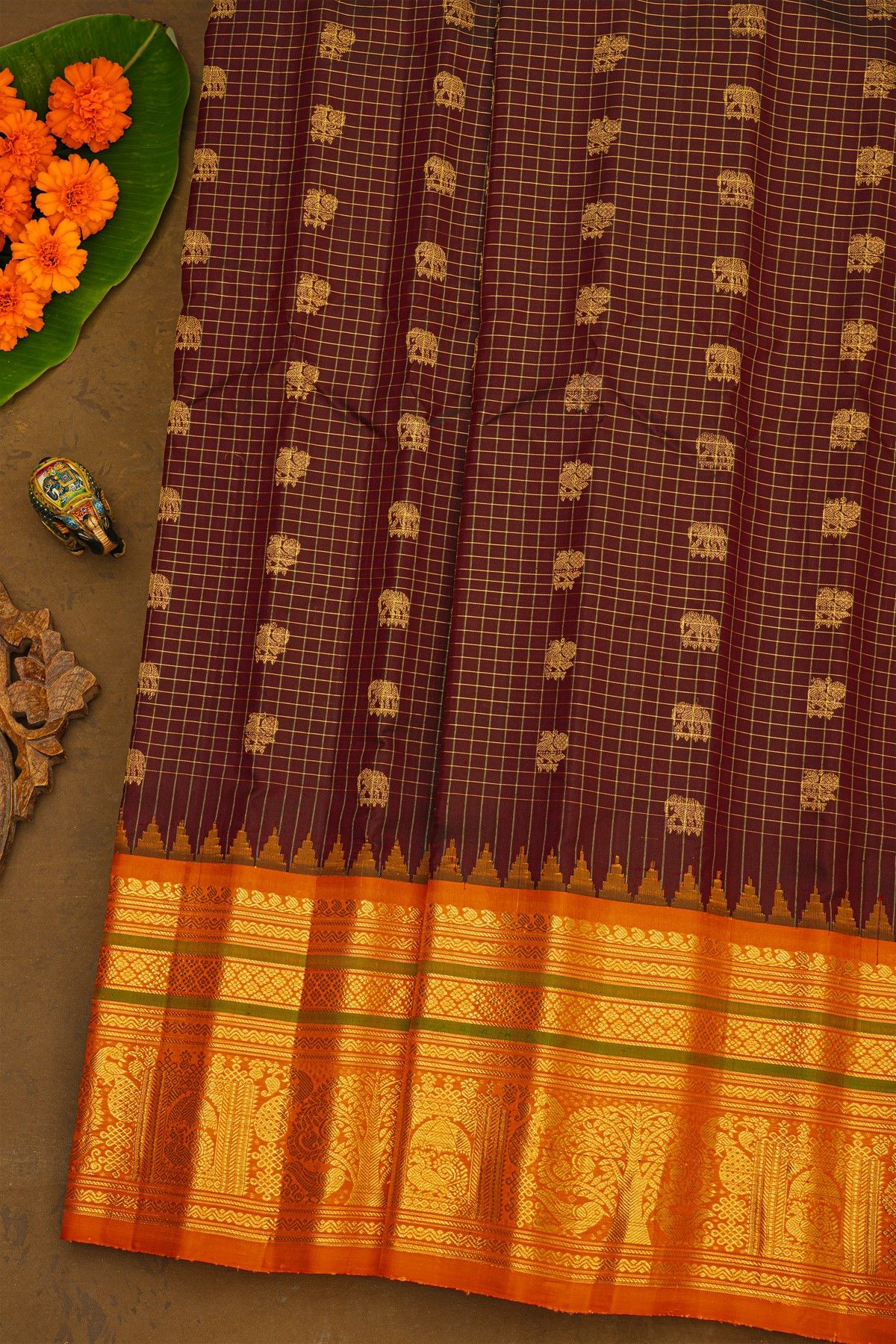 Gadwal Silk Maroon Saree With Elephants And Peacocks Buttis In Checks Body