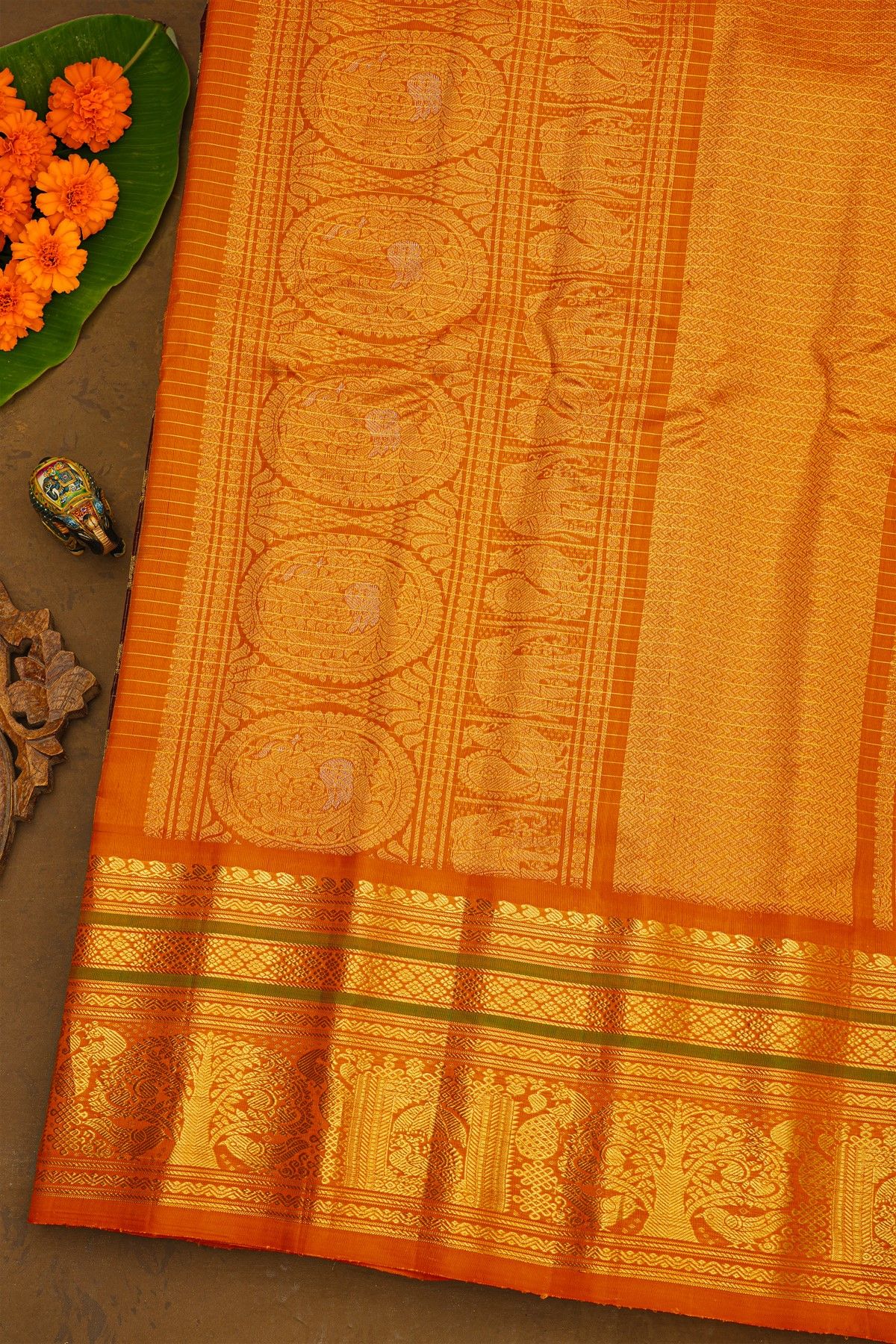 Gadwal Silk Maroon Saree With Elephants And Peacocks Buttis In Checks Body