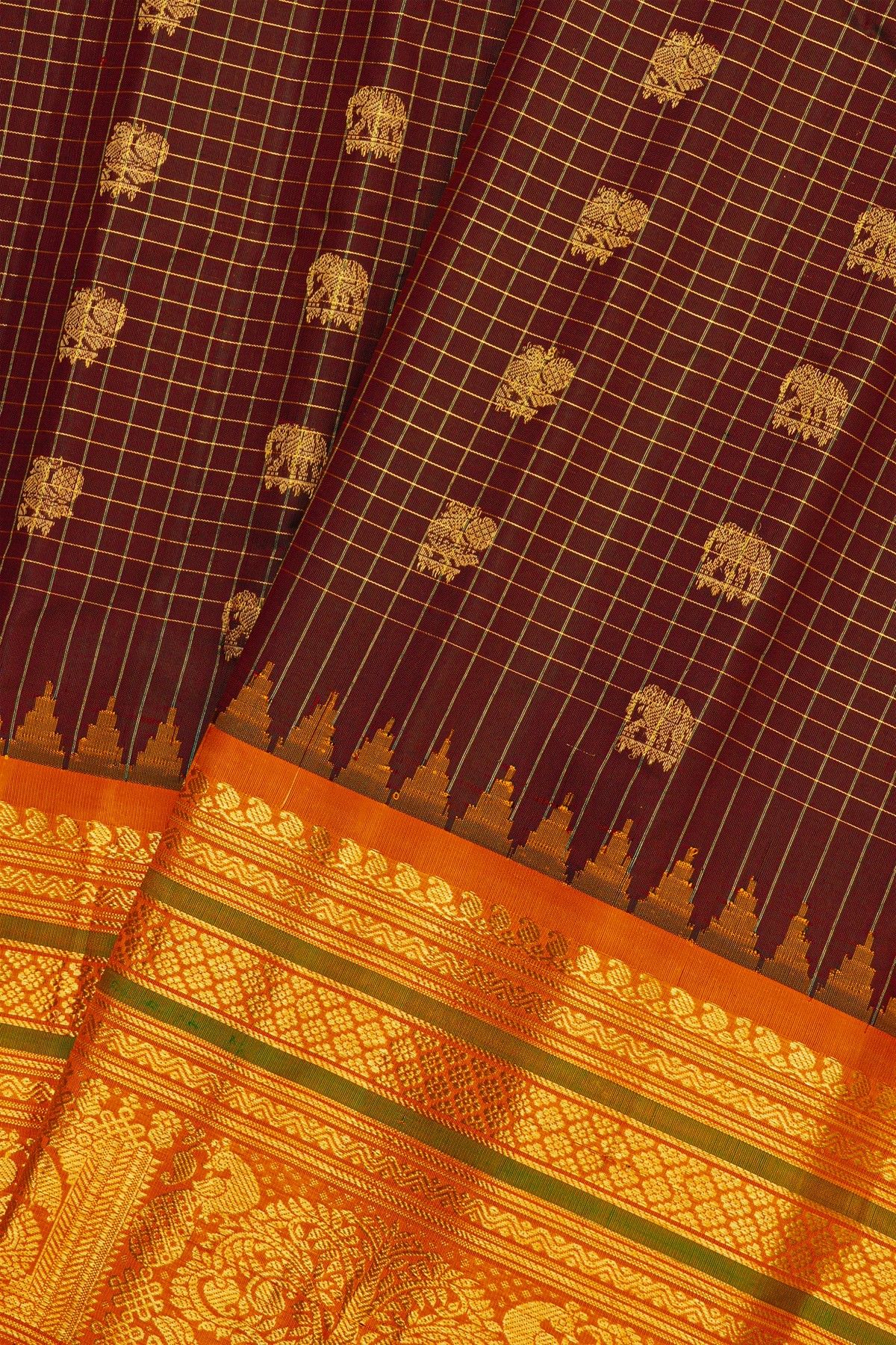 Gadwal Silk Maroon Saree With Elephants And Peacocks Buttis In Checks Body