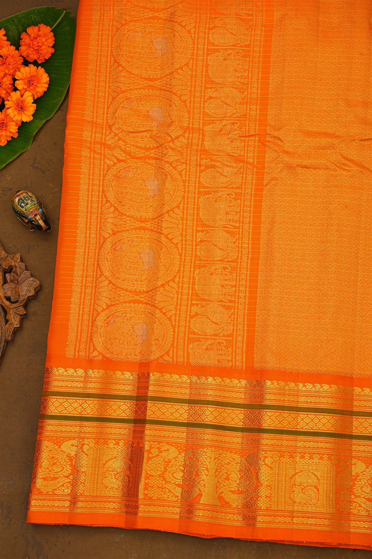 Gadwal Silk Peach Saree With Zari Checks Peacocks And Elephants Buttis Body