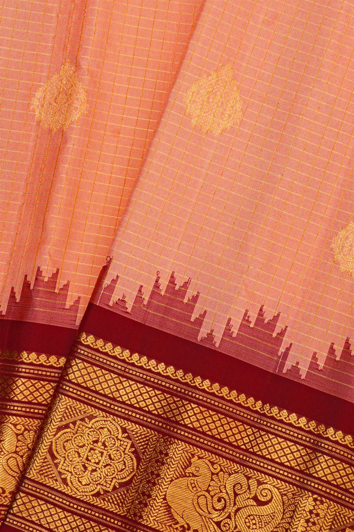 Gadwal Silk Peach Saree With Floral And Peacock In Checks Border