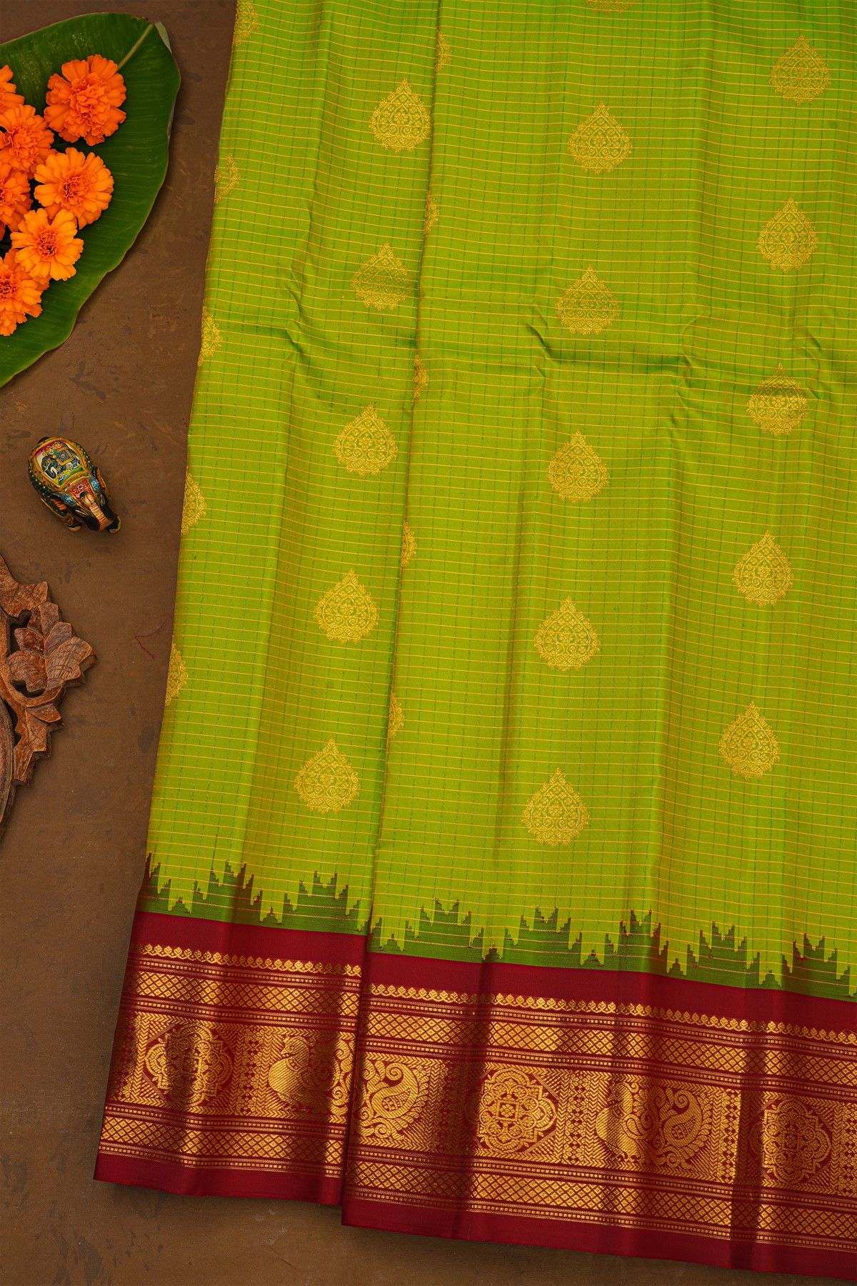 Gadwal Silk Leaf Green Saree With Florals And Peacock Contrast Border