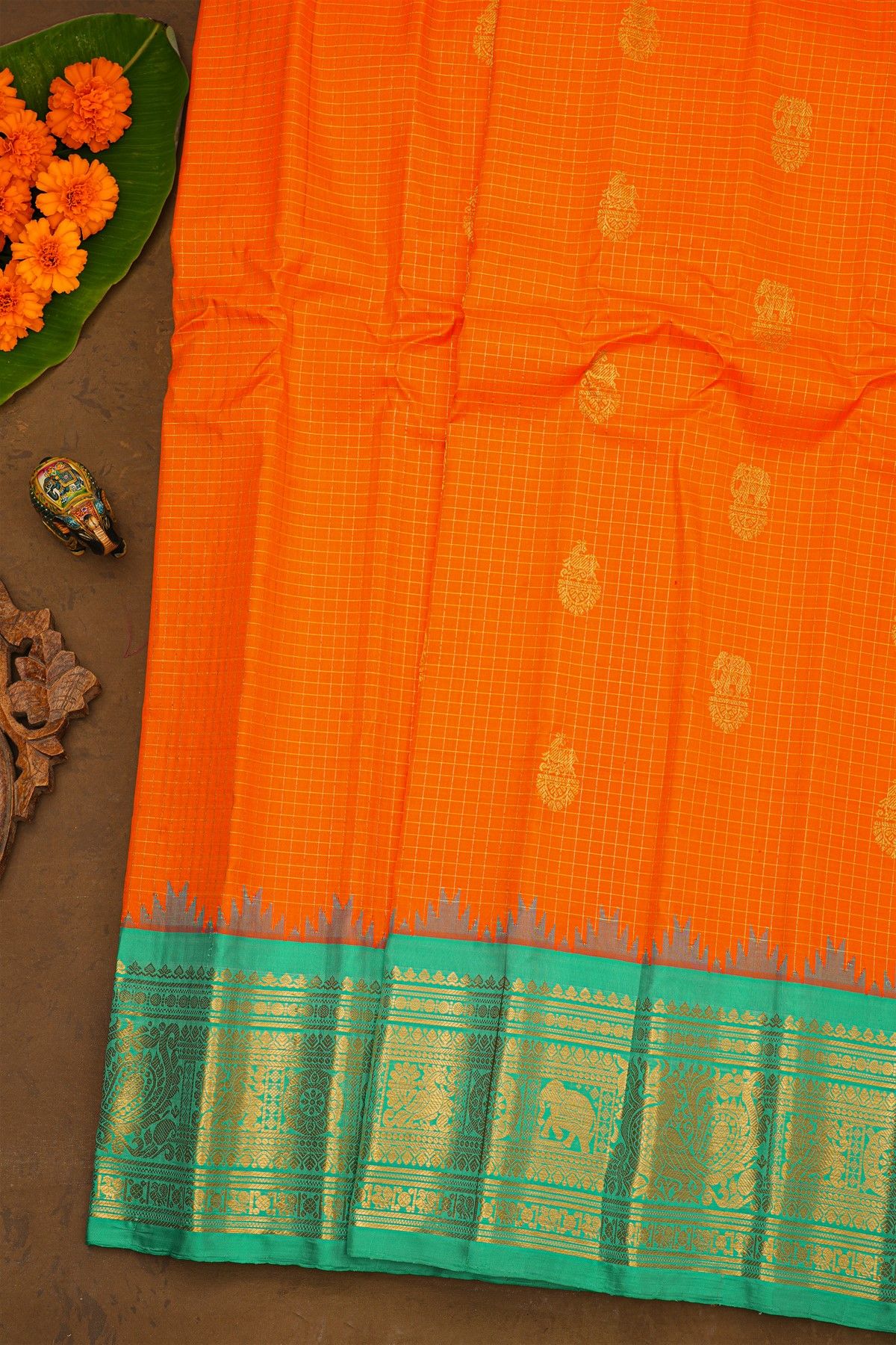 Gadwal Silk Orange Saree With Animal Buttis And Checks Body