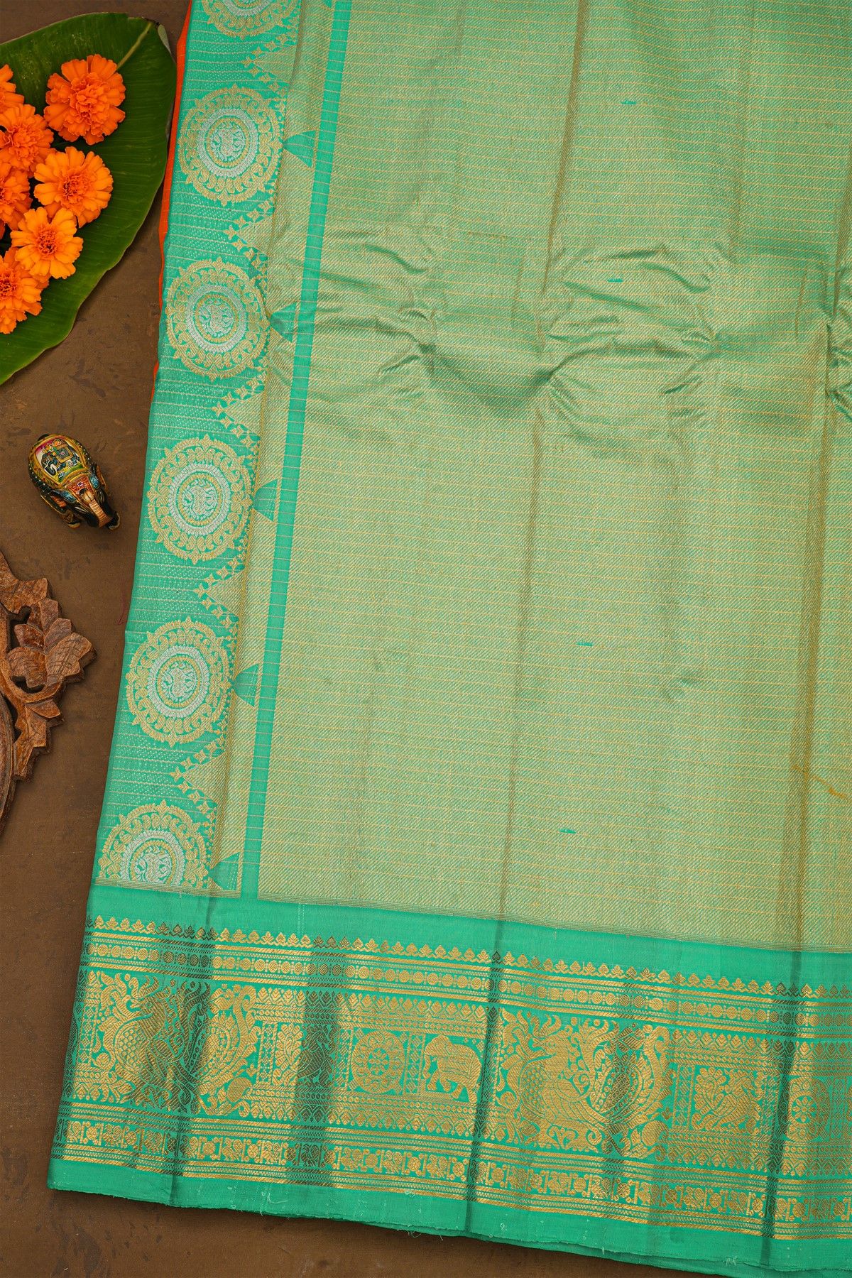 Gadwal Silk Orange Saree With Animal Buttis And Checks Body