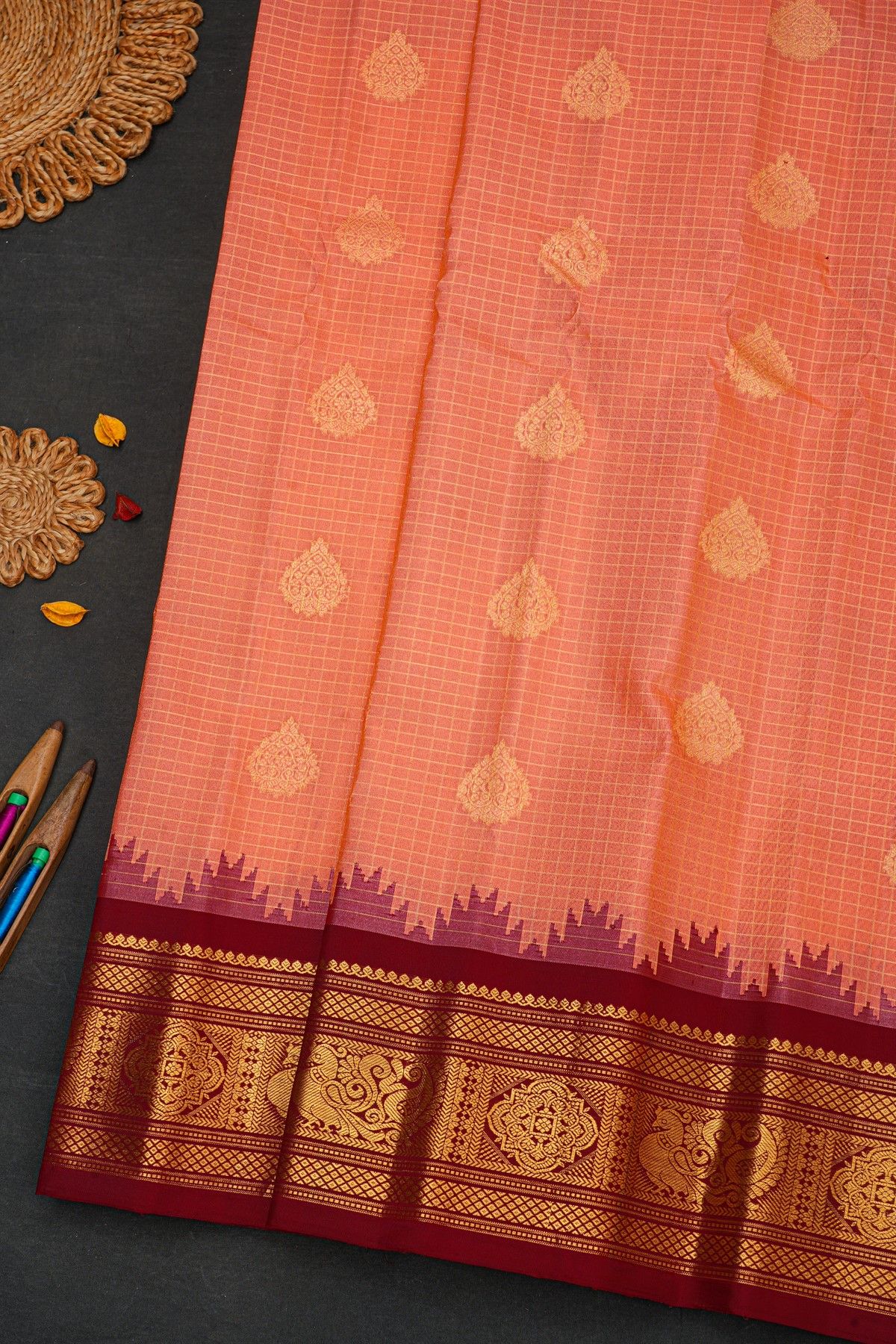 Gadwal Silk Peach Orange Saree With Floral And Peacock Border