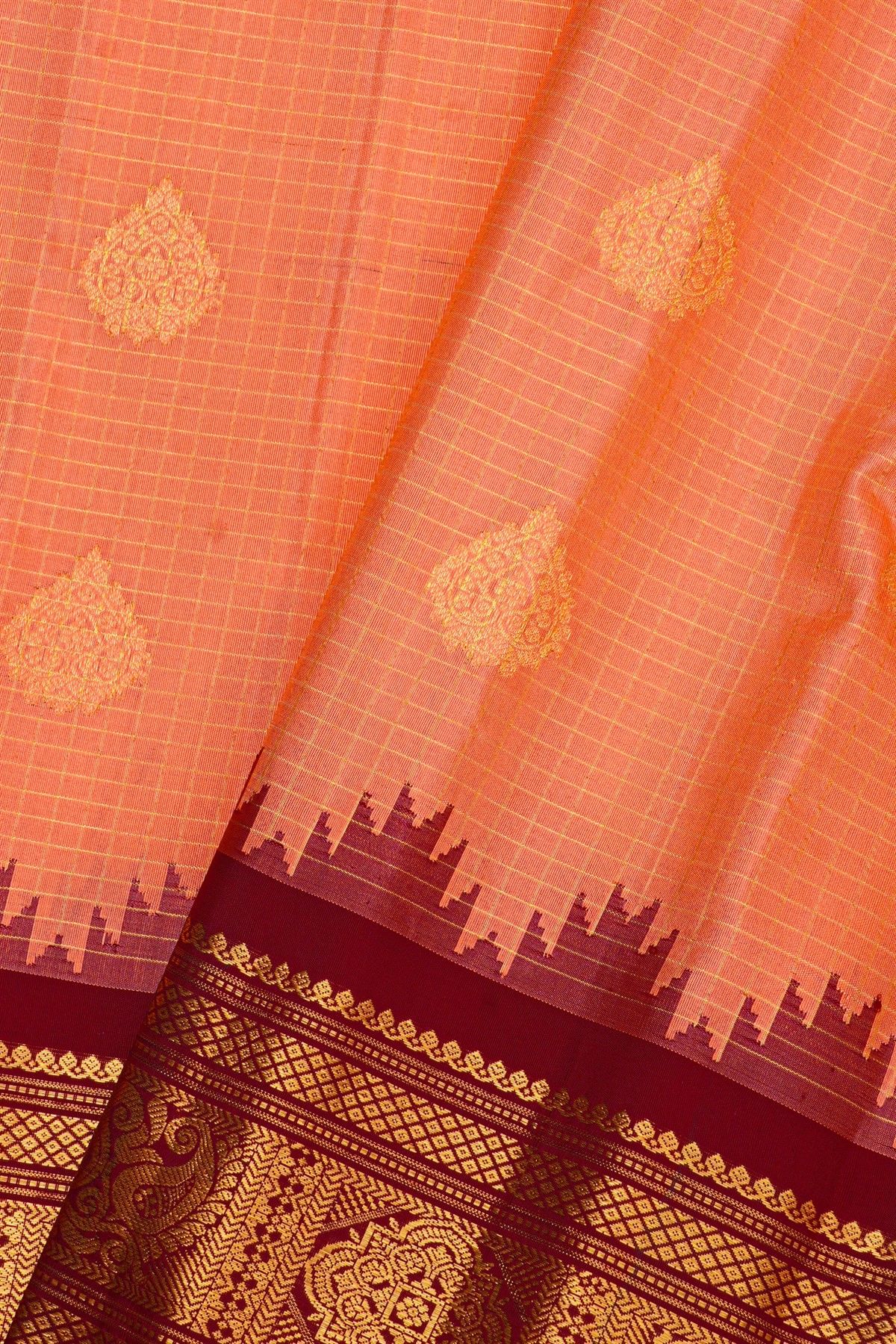 Gadwal Silk Peach Orange Saree With Floral And Peacock Border