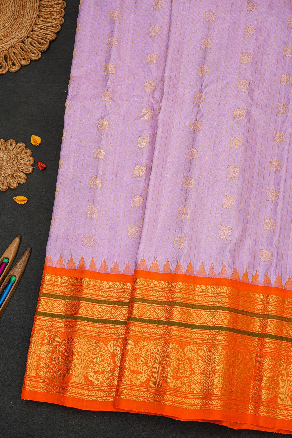 Gadwal Silk Lilac Saree With Elephants And Peacock Buttis In Checks Body