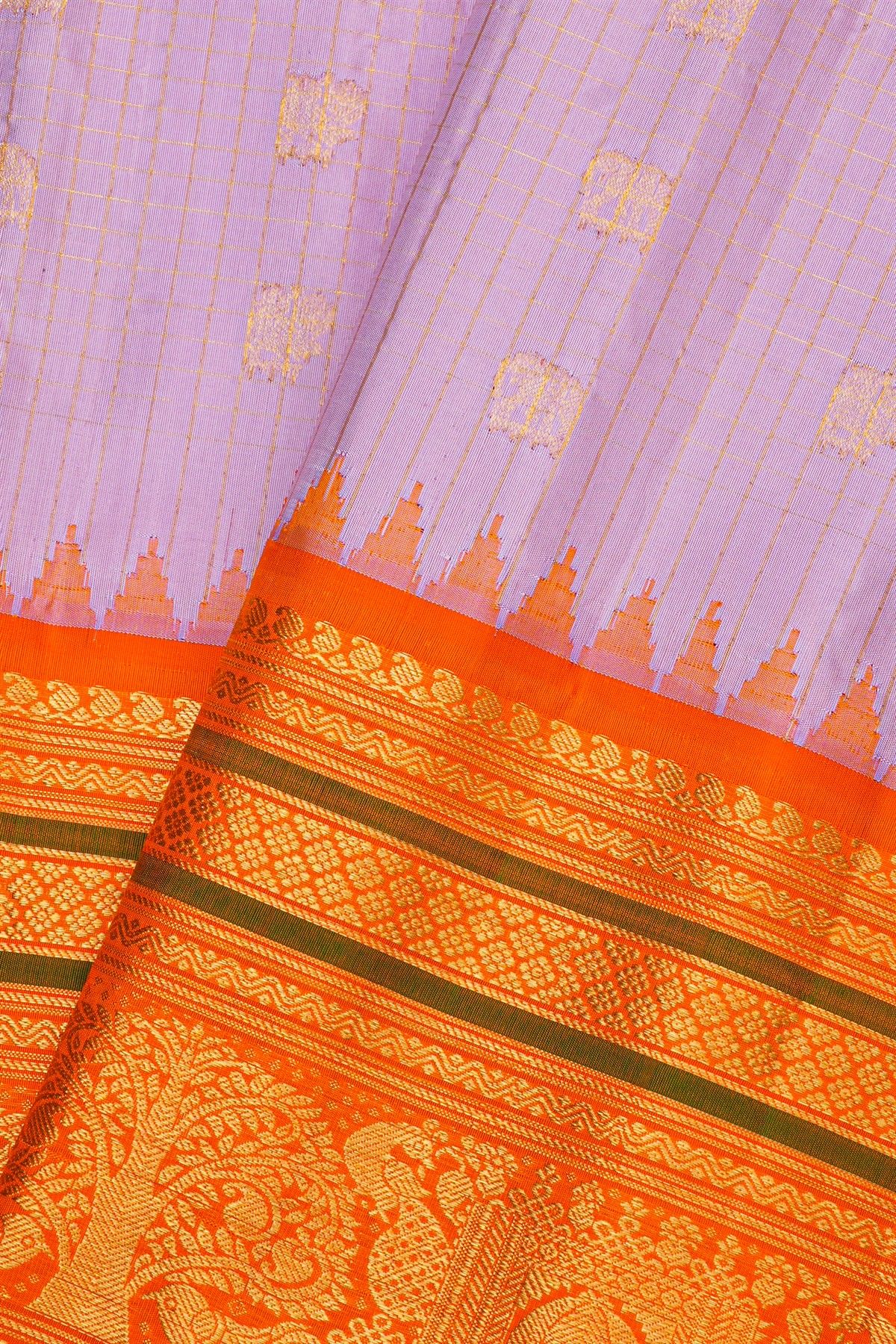 Gadwal Silk Lilac Saree With Elephants And Peacock Buttis In Checks Body