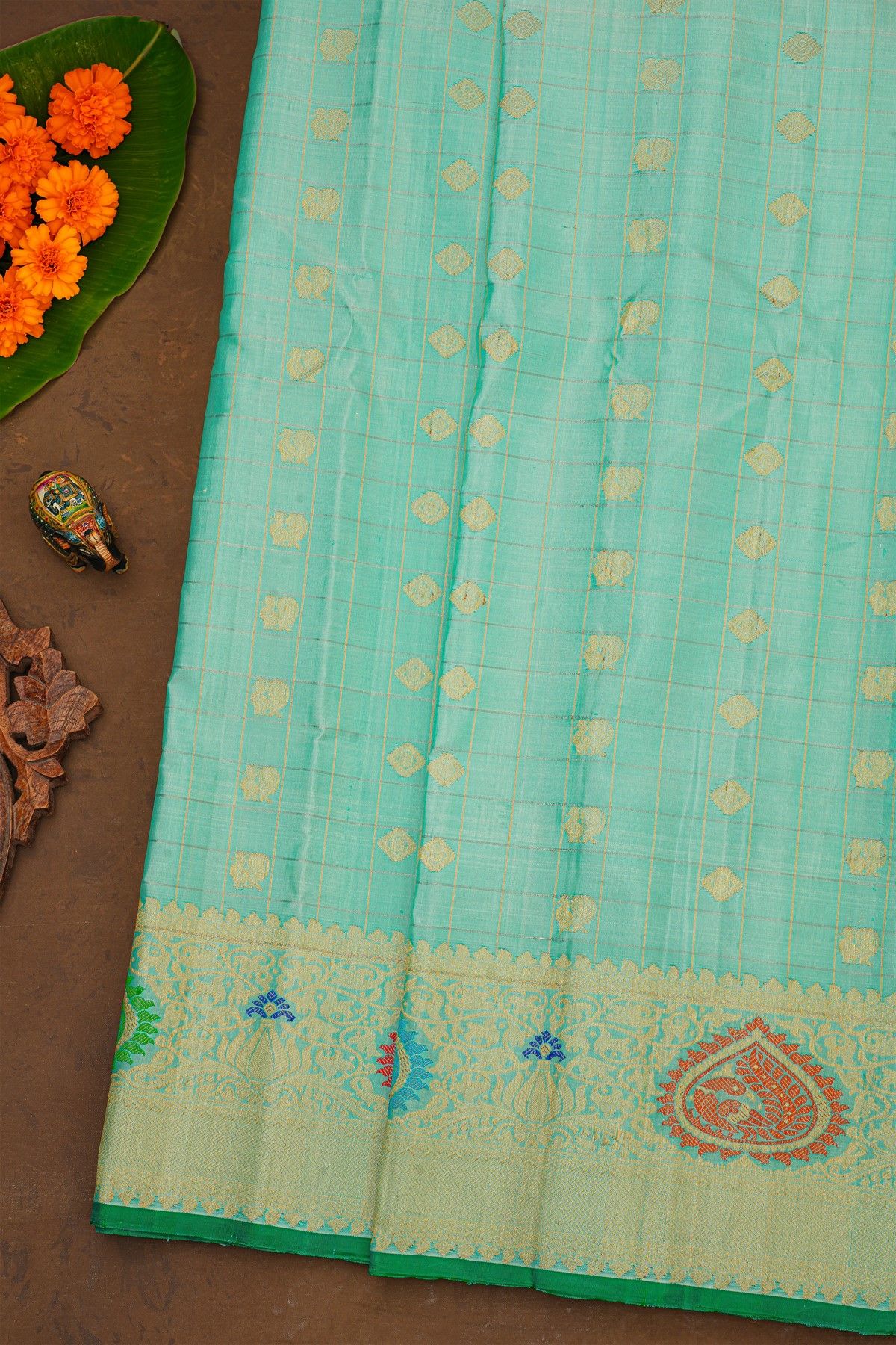 Gadwal Silk Mint Green Saree With Florals And Peacock Body