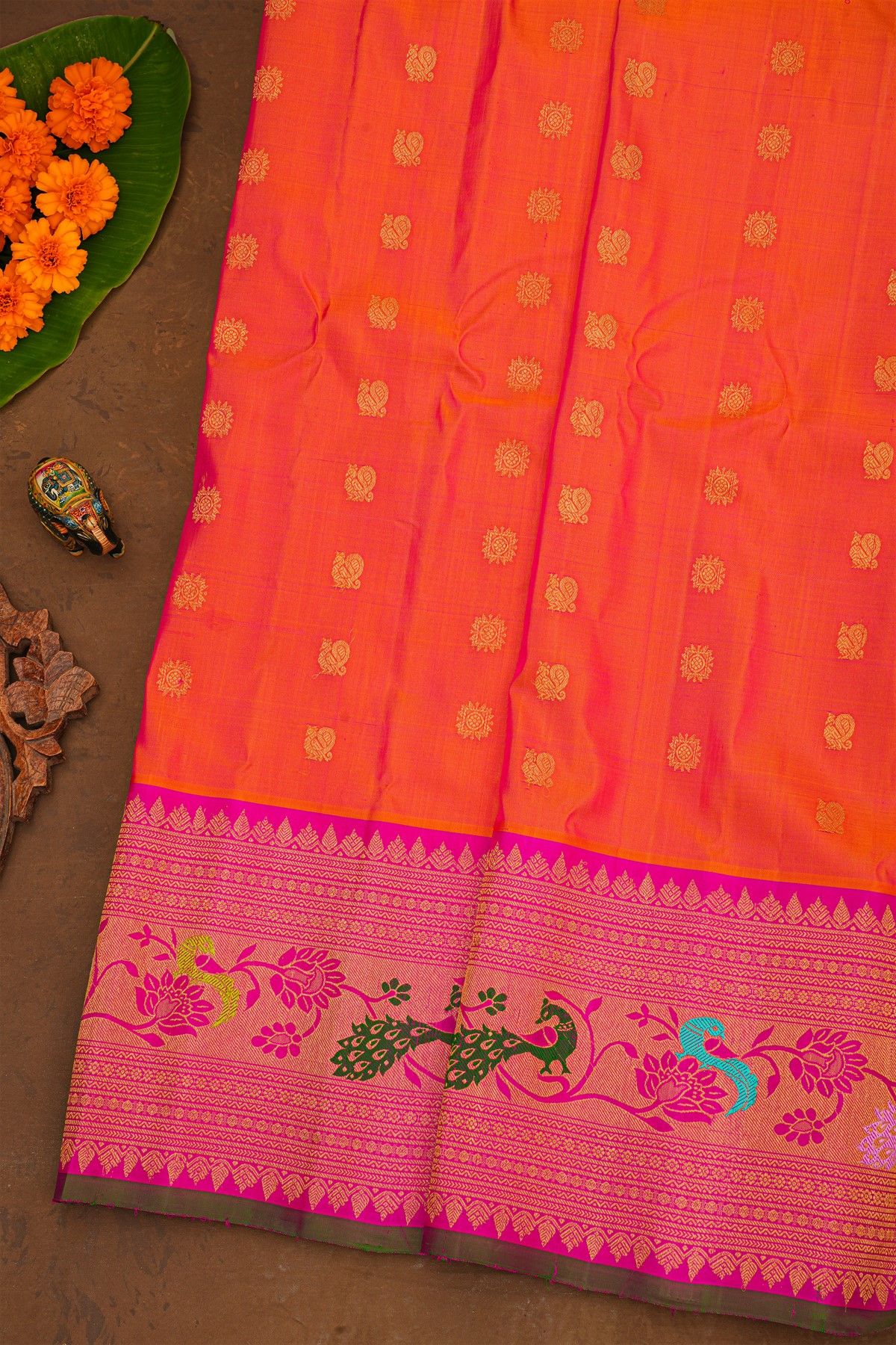 Gadwal Silk Dual Colour Saree With Florals And Peacock Buttis Body