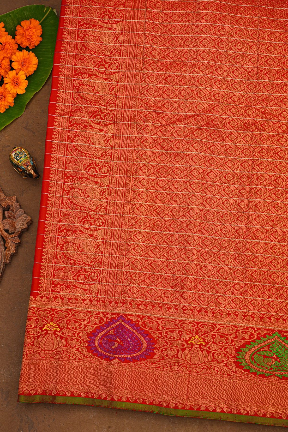 Gadwal Silk Red Saree With Florals And Peacock Buttis Body