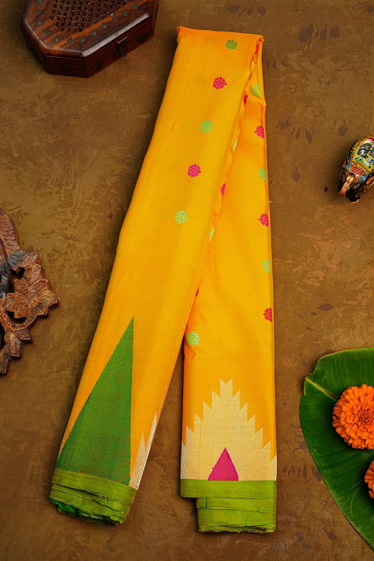 Gadwal Silk Yellow Saree With Florals Body And Temple Border