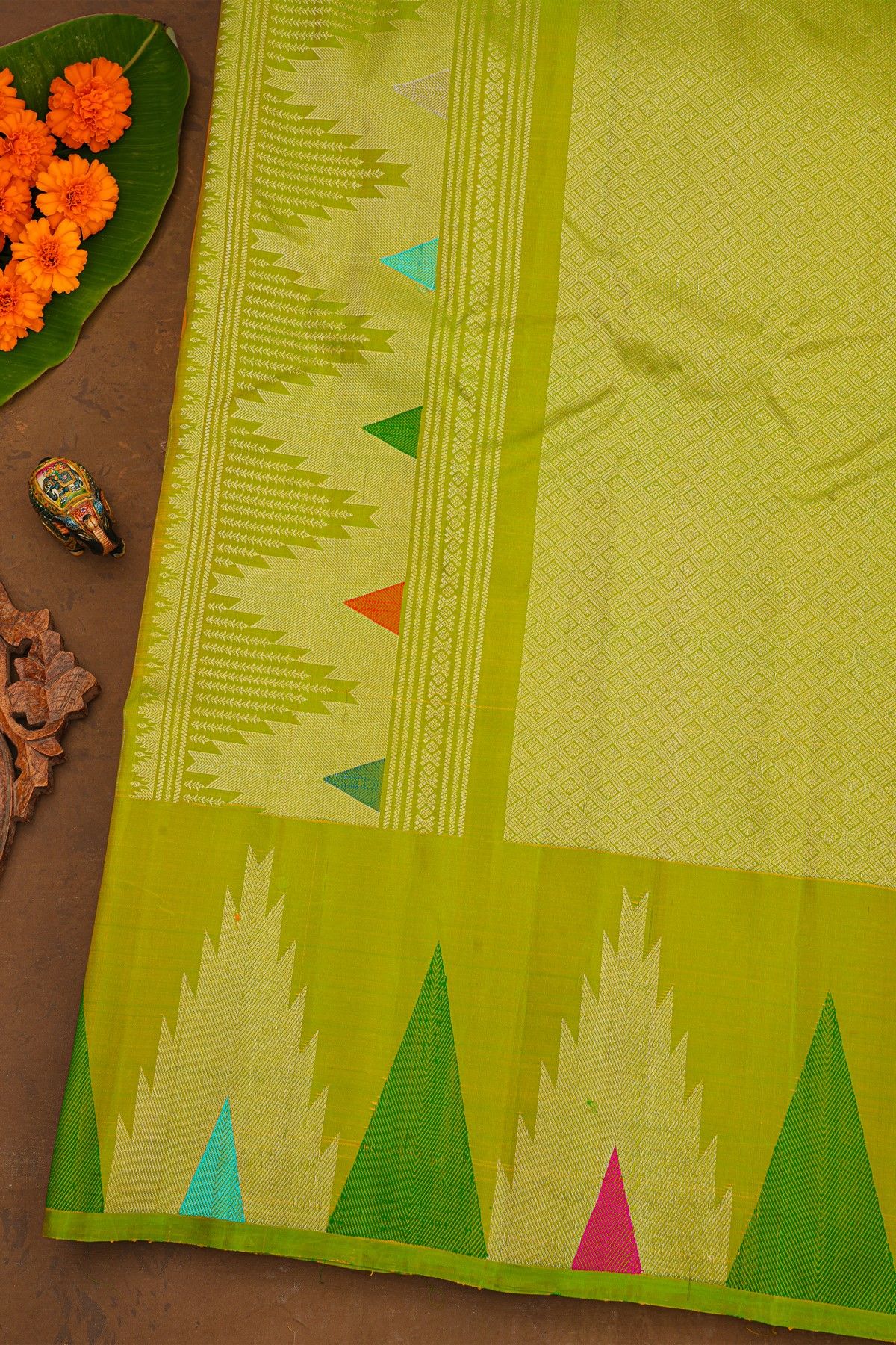 Gadwal Silk Yellow Saree With Florals Body And Temple Border