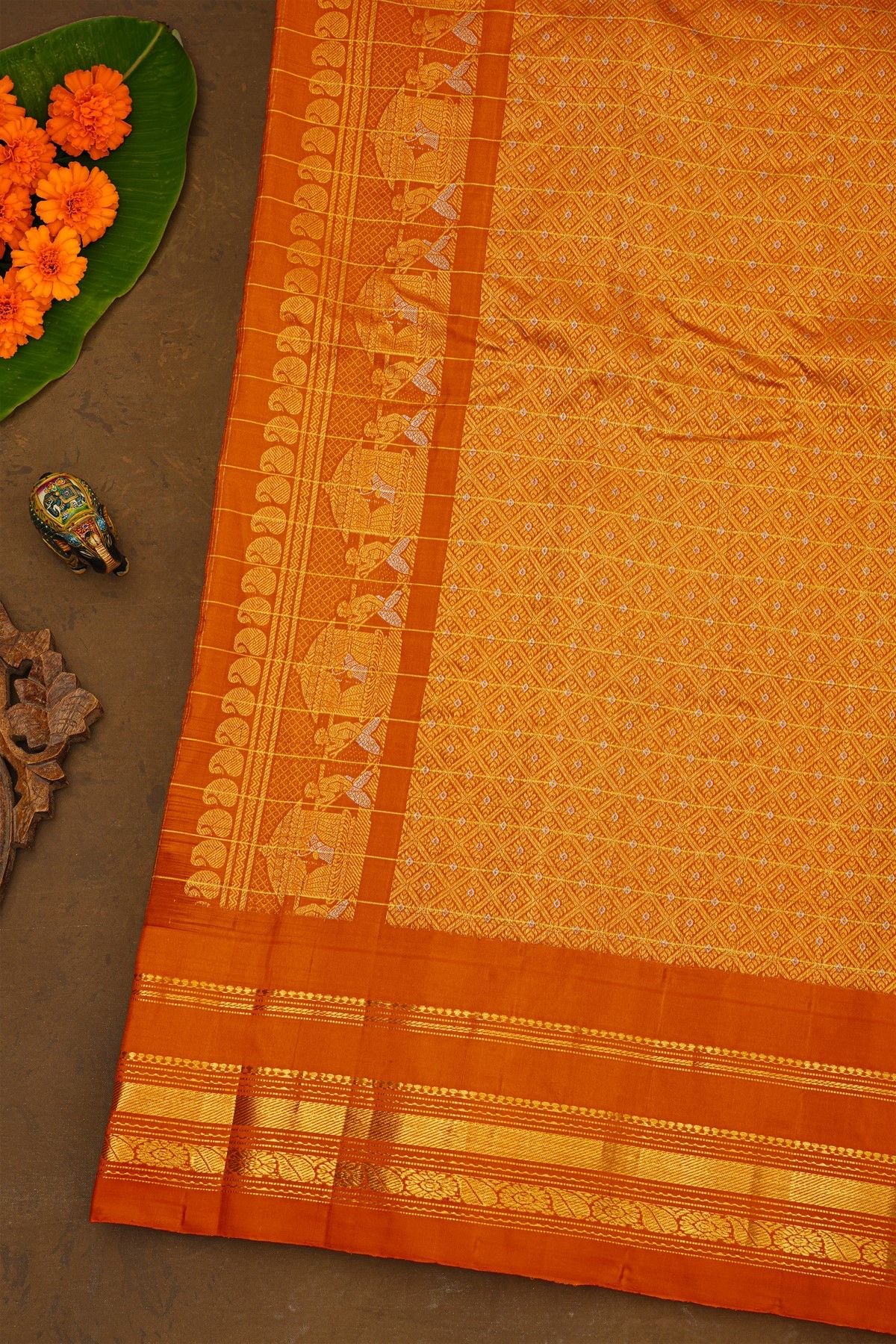 Gadwal Silk Maroon Saree With Florals In Zari Checks And Contrast Border