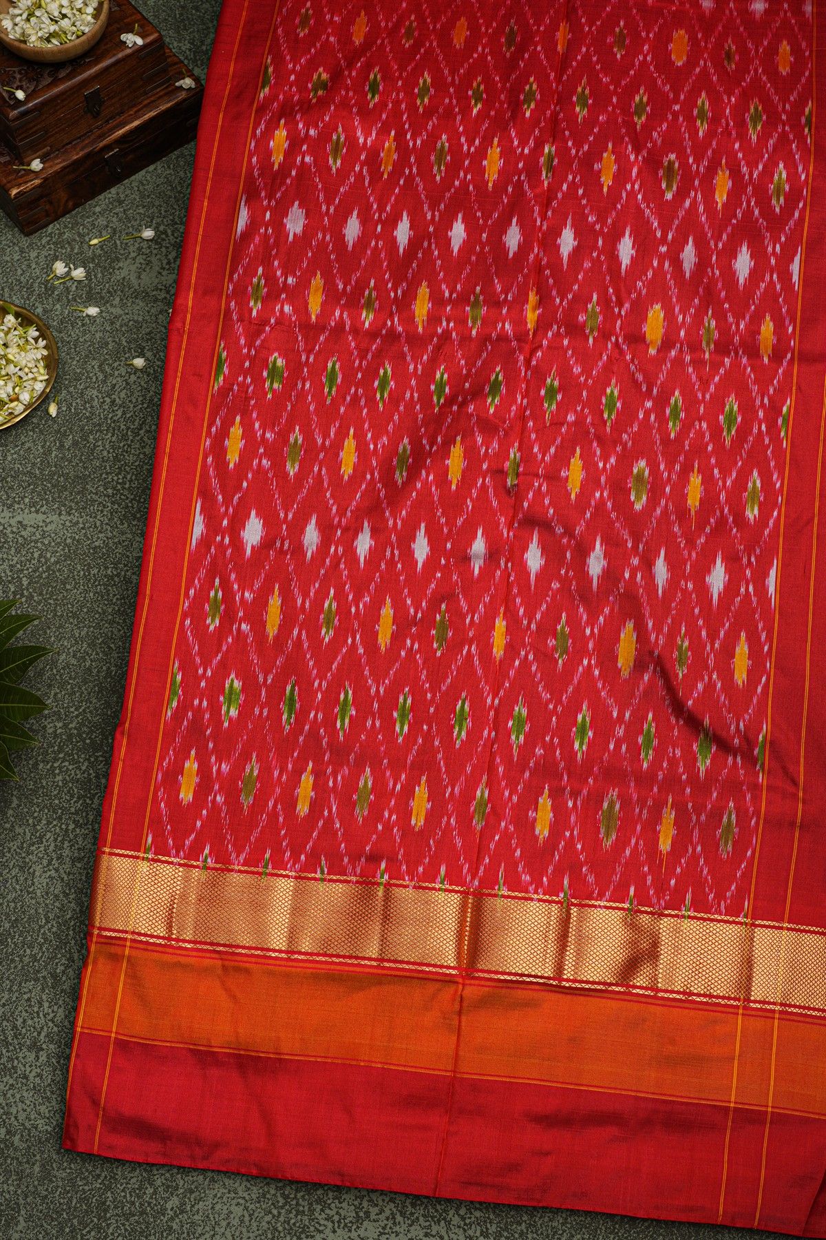 Ikat Silk Bottle Green Saree