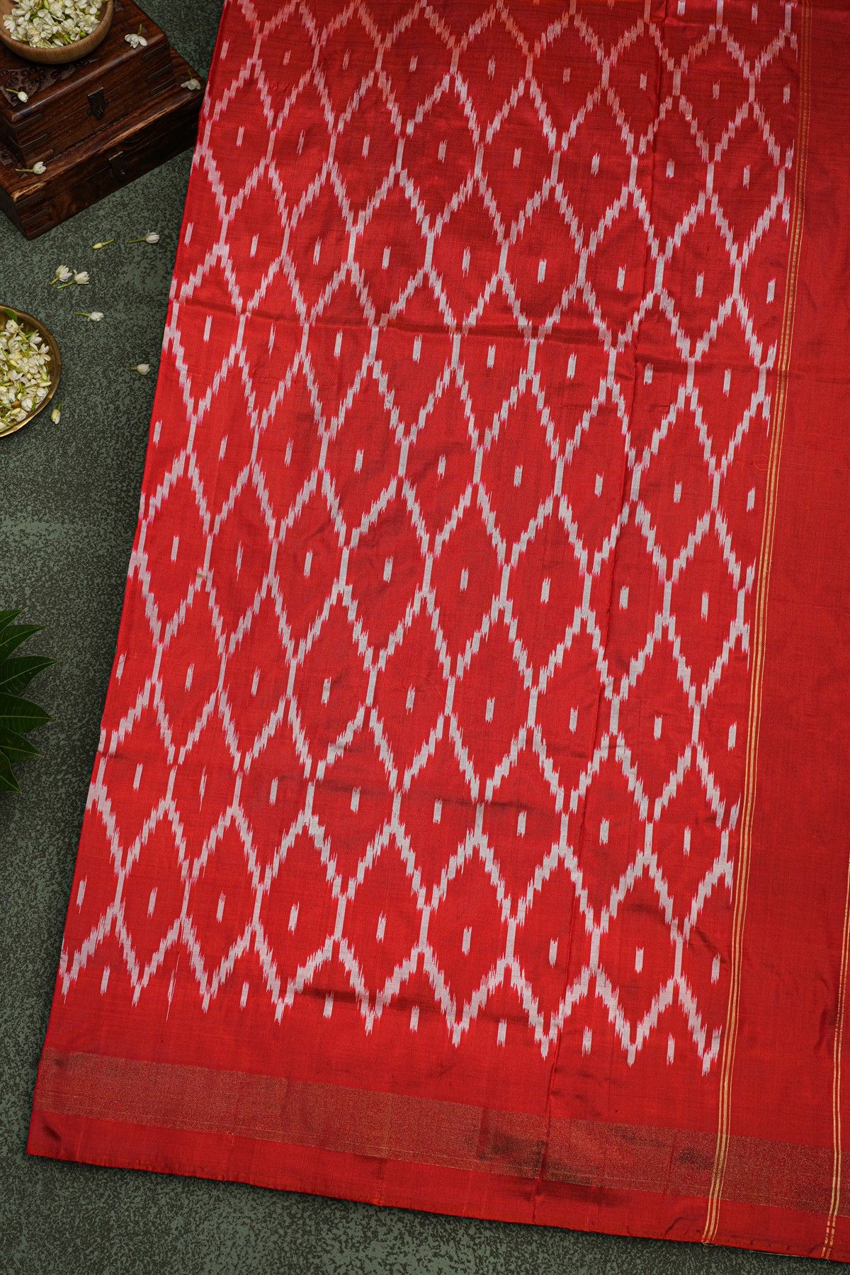 Ikat Silk Bottle Green Saree