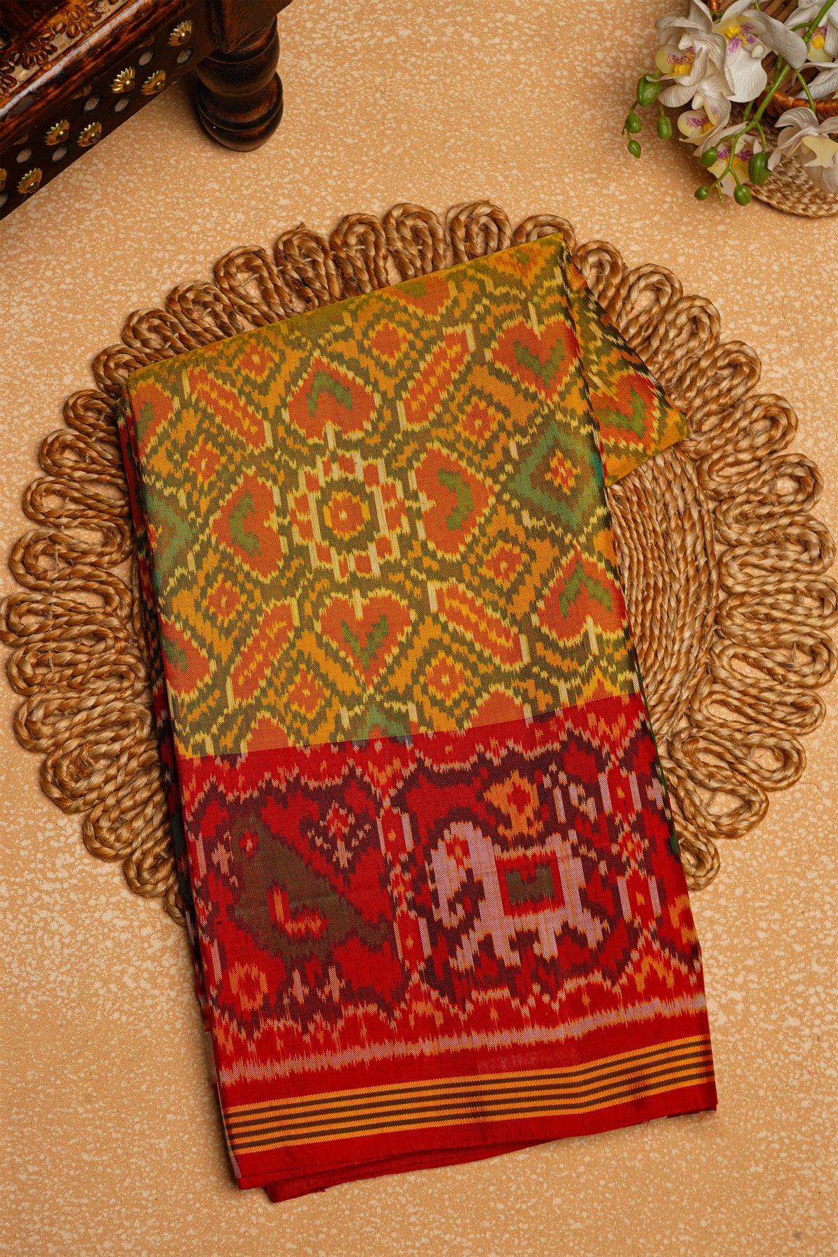 Patola Silk Multi Colour Saree And Florals With Leaves Jaal, Florals And Leaves Body And Contrast Elephants And Parrots In Box Border