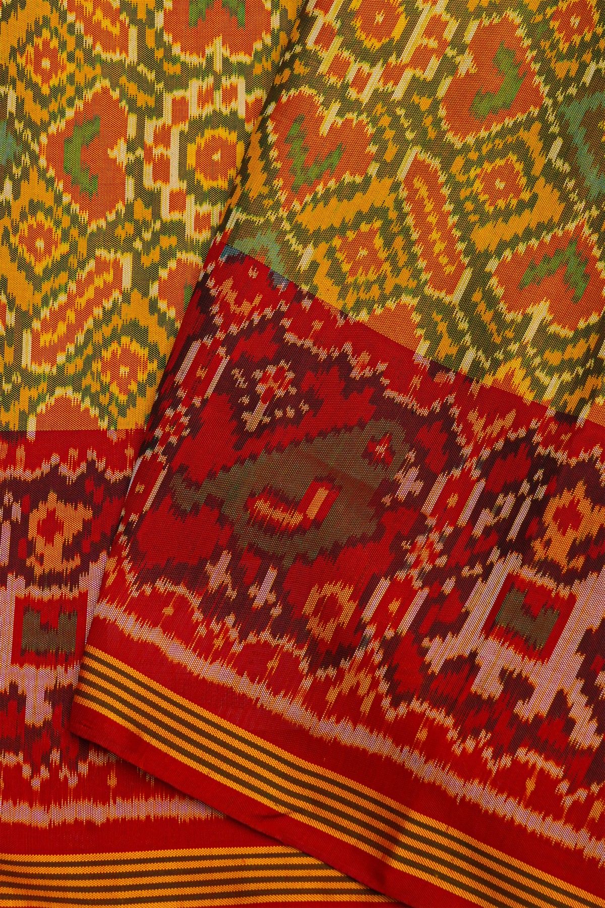 Patola Silk Multi Colour Saree And Florals With Leaves Jaal, Florals And Leaves Body And Contrast Elephants And Parrots In Box Border