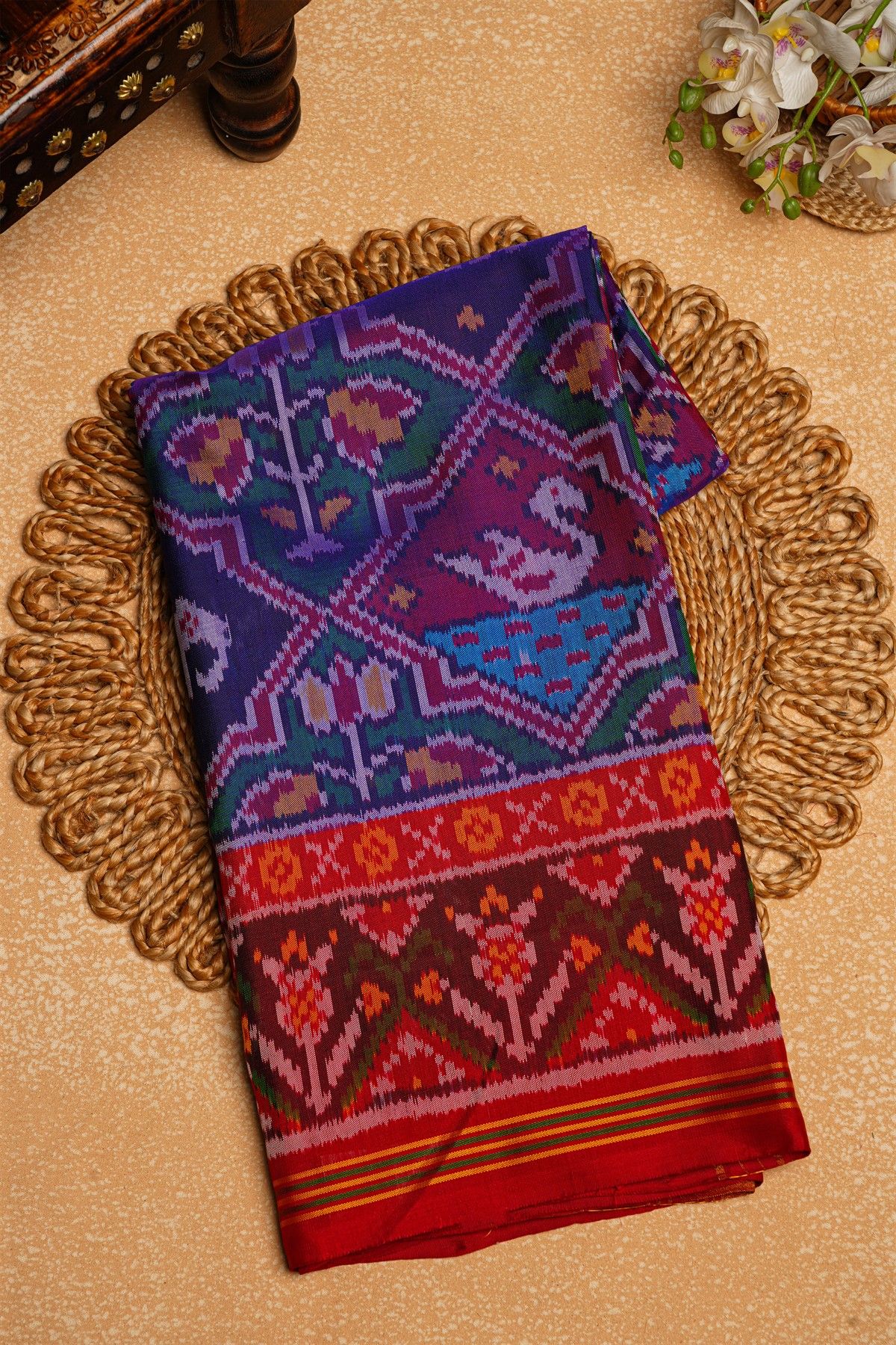 Patola Silk Dual Colour Saree With Florals, Leaves And Birds Body And Contrast Florals And Leaves Border