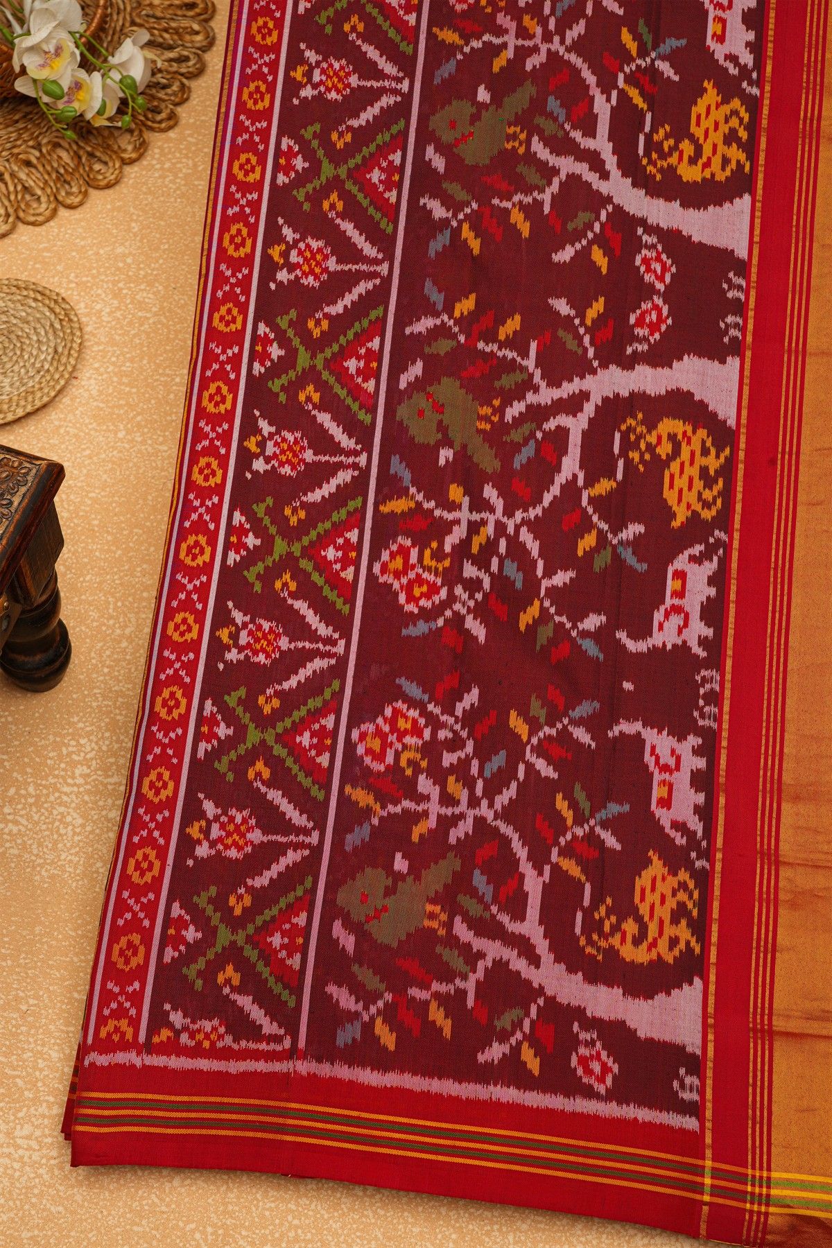 Patola Silk Dual Colour Saree With Florals, Leaves And Birds Body And Contrast Florals And Leaves Border