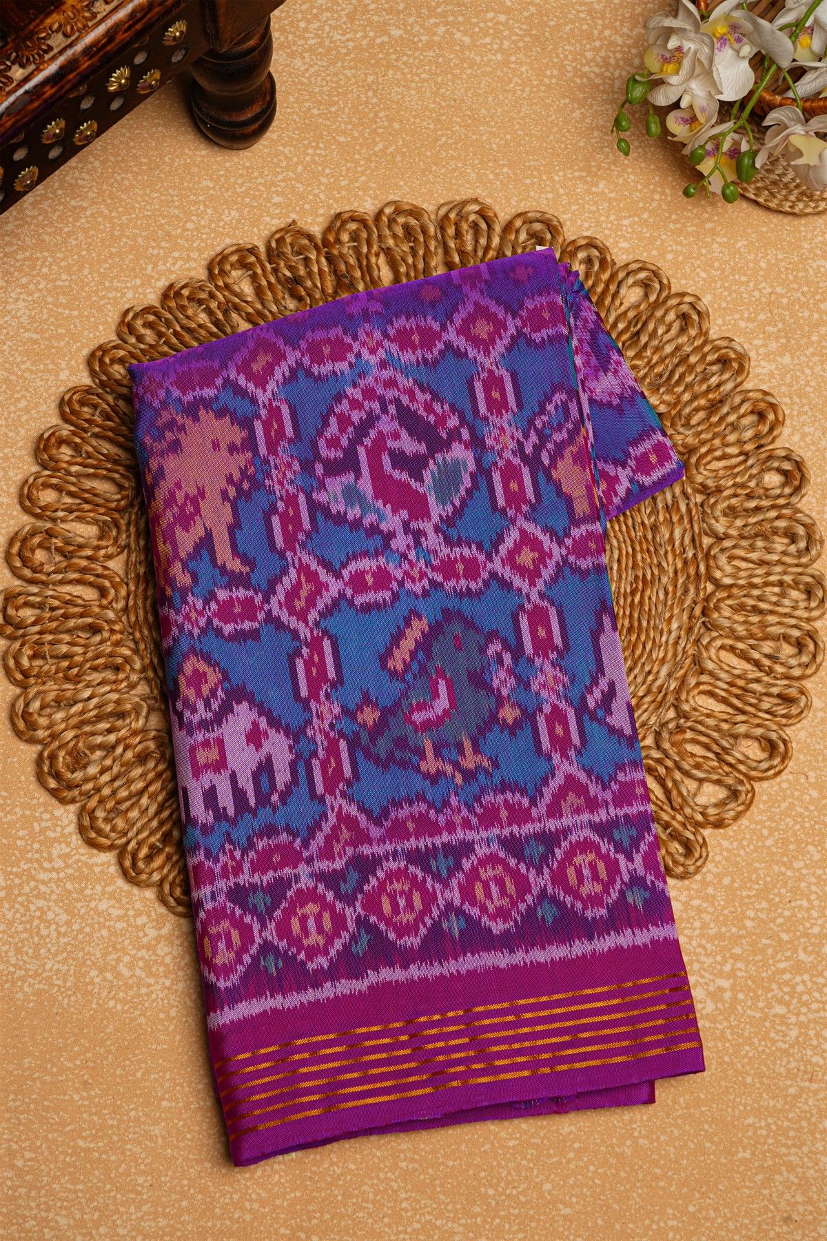 Patola Silk Purple Saree With Florals And Leaves Body And Self Florals And Leaves Border