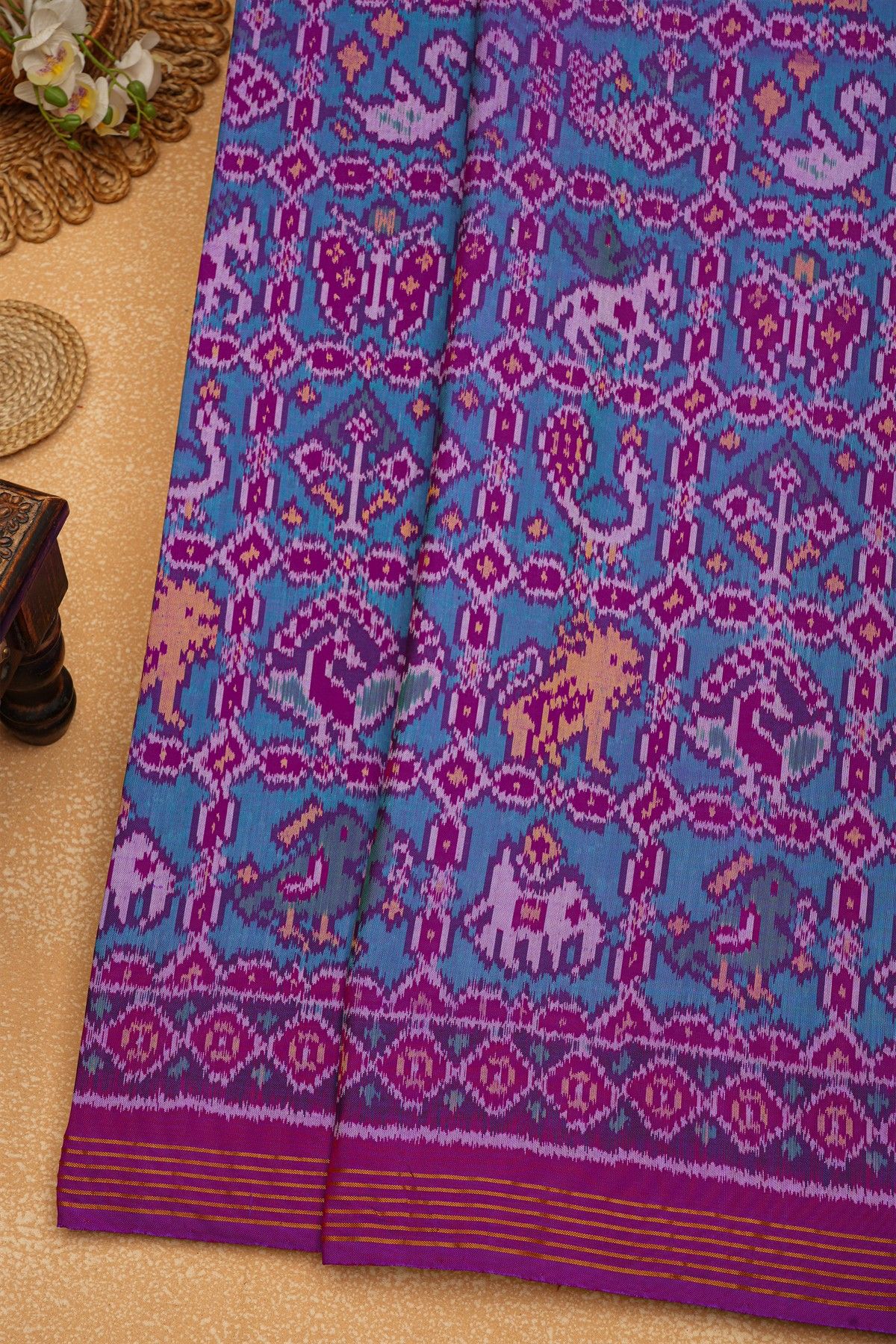 Patola Silk Purple Saree With Florals And Leaves Body And Self Florals And Leaves Border