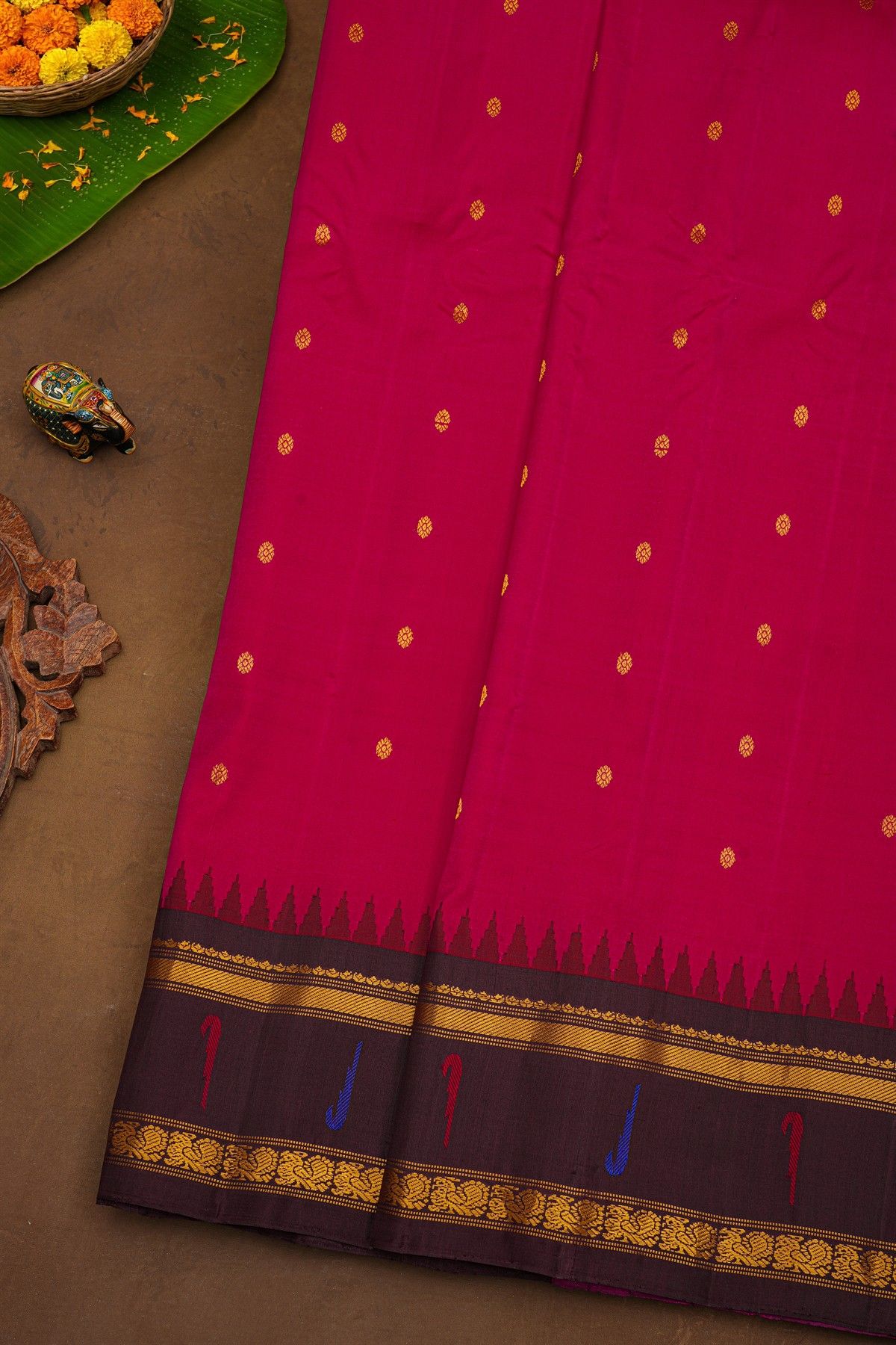 Gadwal Silk Dark Pink Saree With Buttis Body And Muniya And Peacock Border
