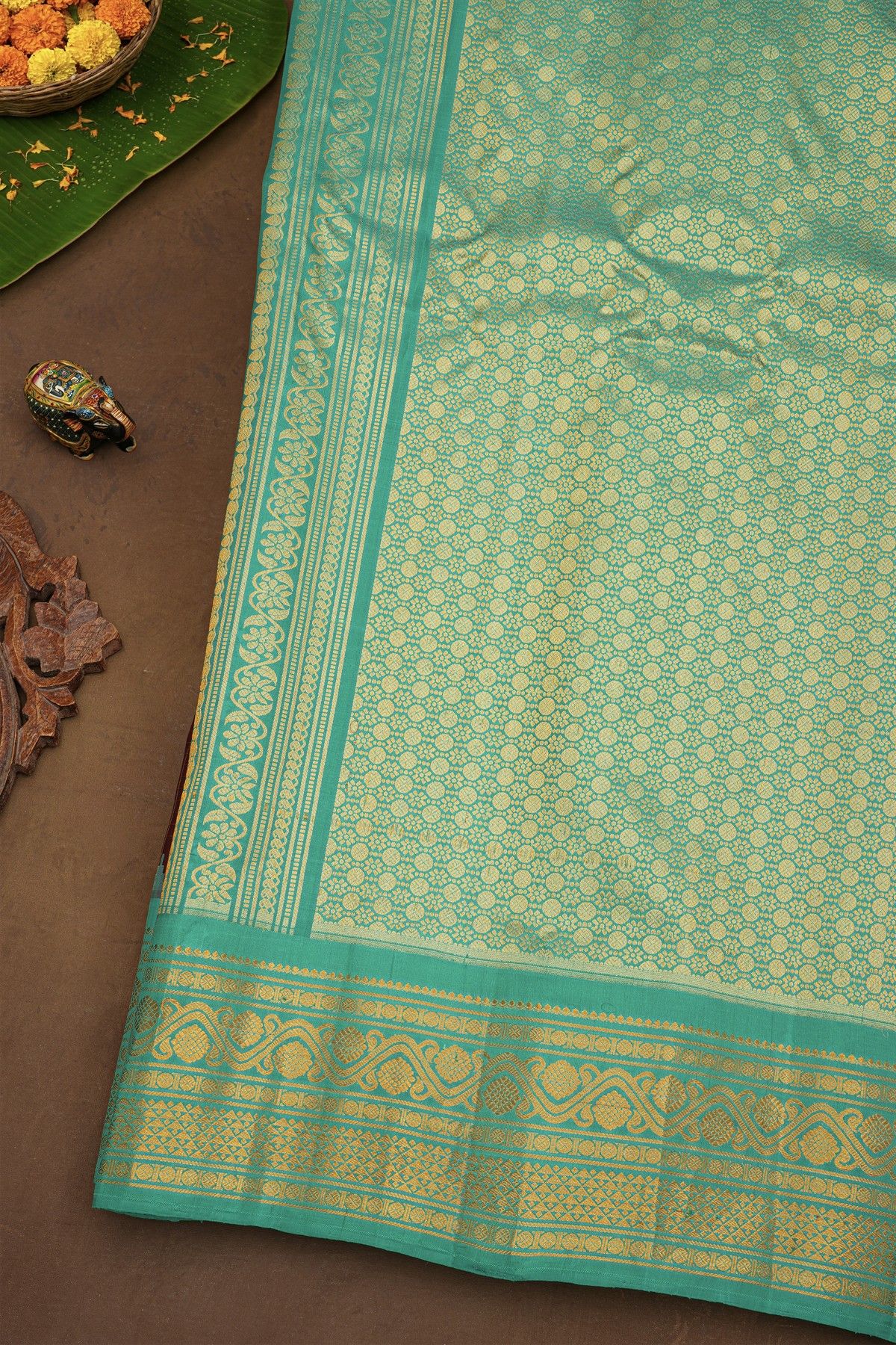 Gadwal Silk Maroon Saree With Florals And Peacocks In Zari Checks