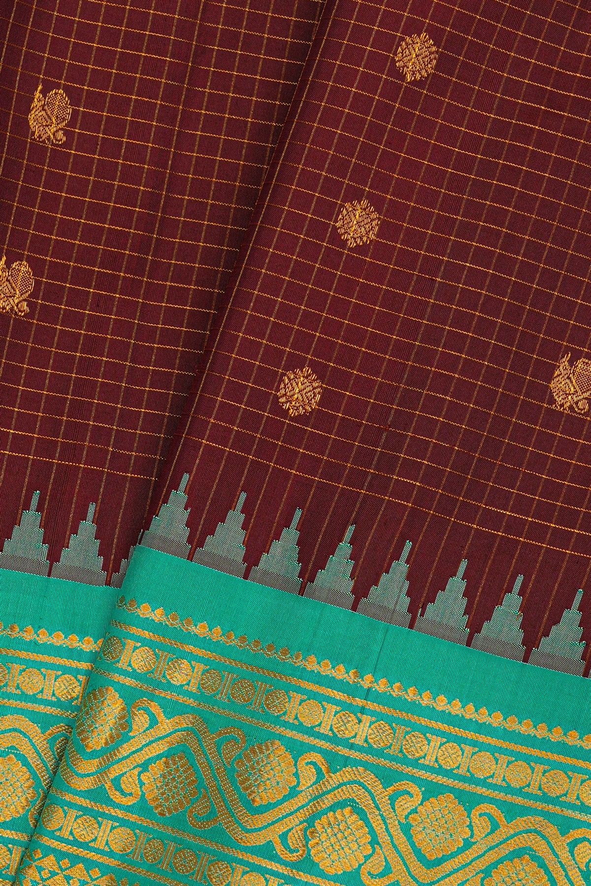 Gadwal Silk Maroon Saree With Florals And Peacocks In Zari Checks