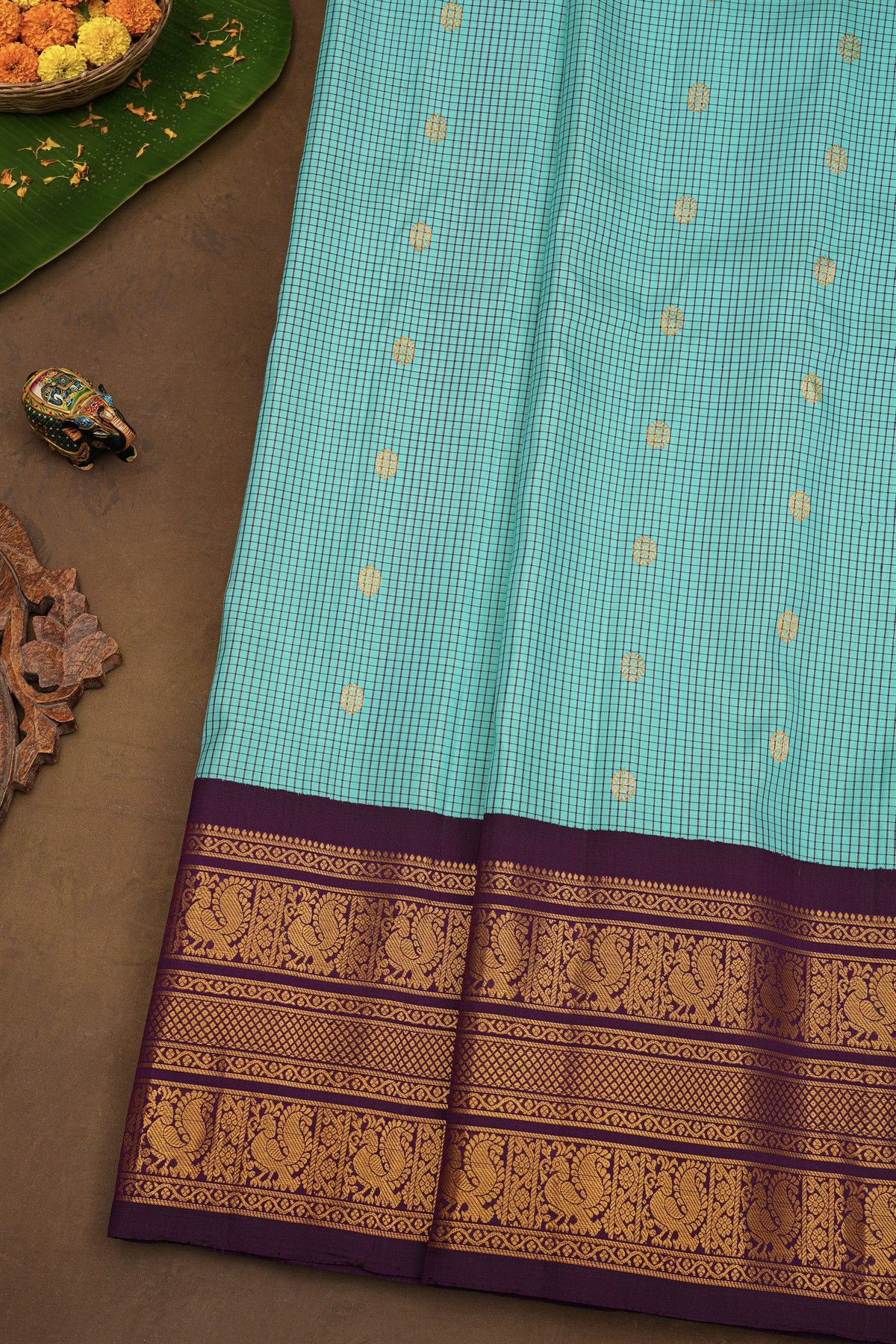 Gadwal Silk Sky Blue Saree With Rudraksha Buttis Body And Peacock Buttis Contrast Border