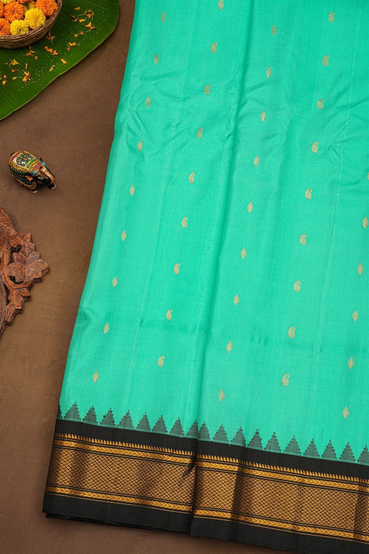 Gadwal Silk Turquoise Blue Saree With Buttis Body And Contrast Kaddi Border