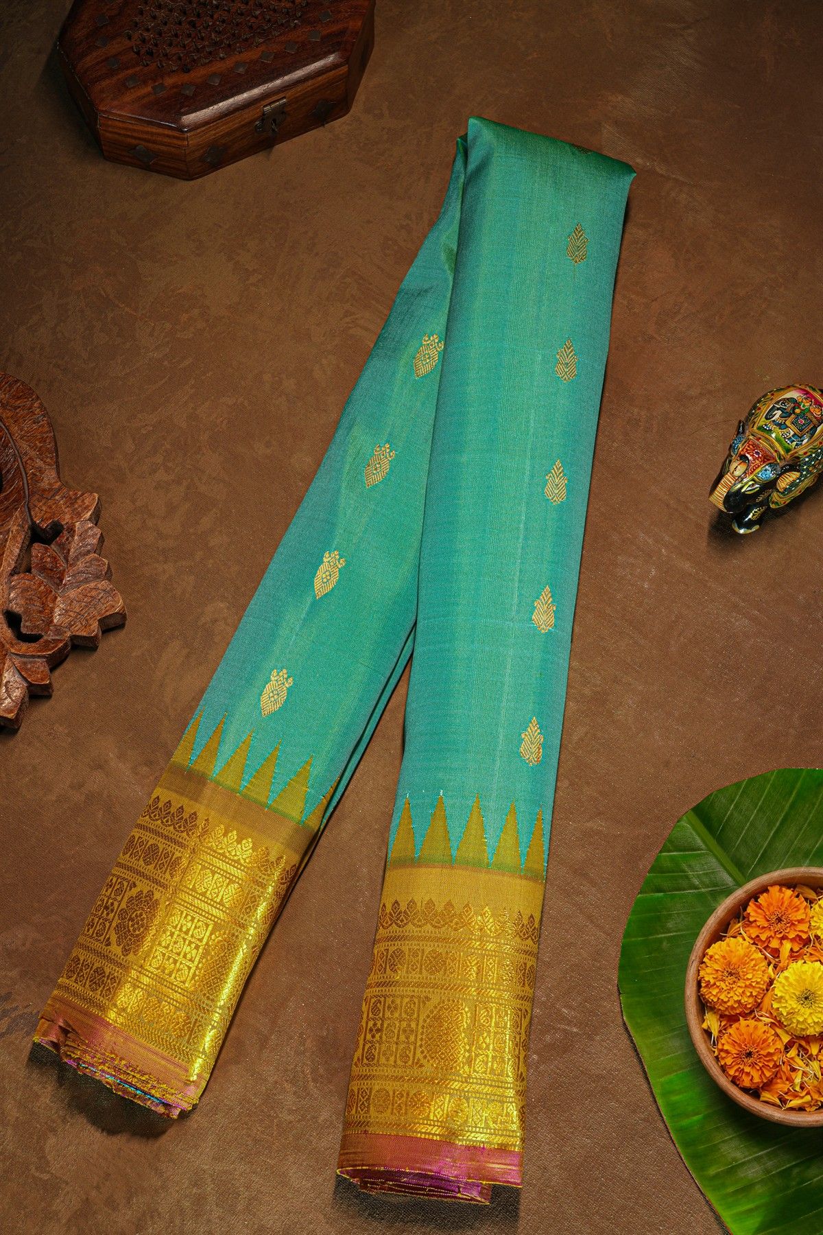 Gadwal Silk Sky Blue Saree With Florals And Leaves In Zari