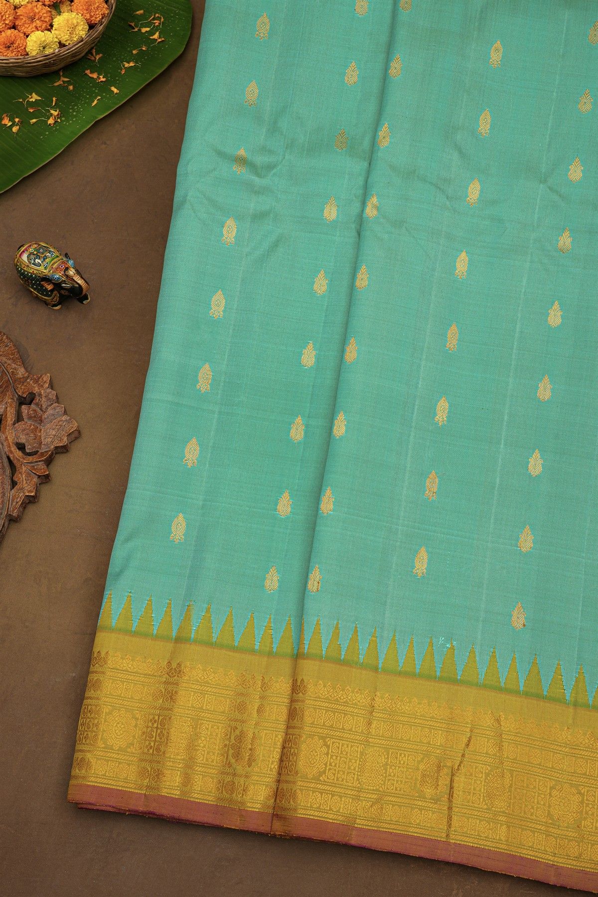 Gadwal Silk Sky Blue Saree With Florals And Leaves In Zari