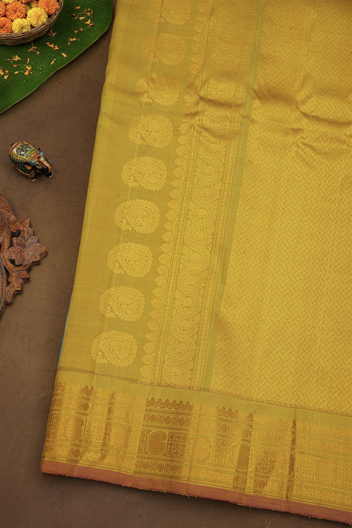 Gadwal Silk Sky Blue Saree With Florals And Leaves In Zari