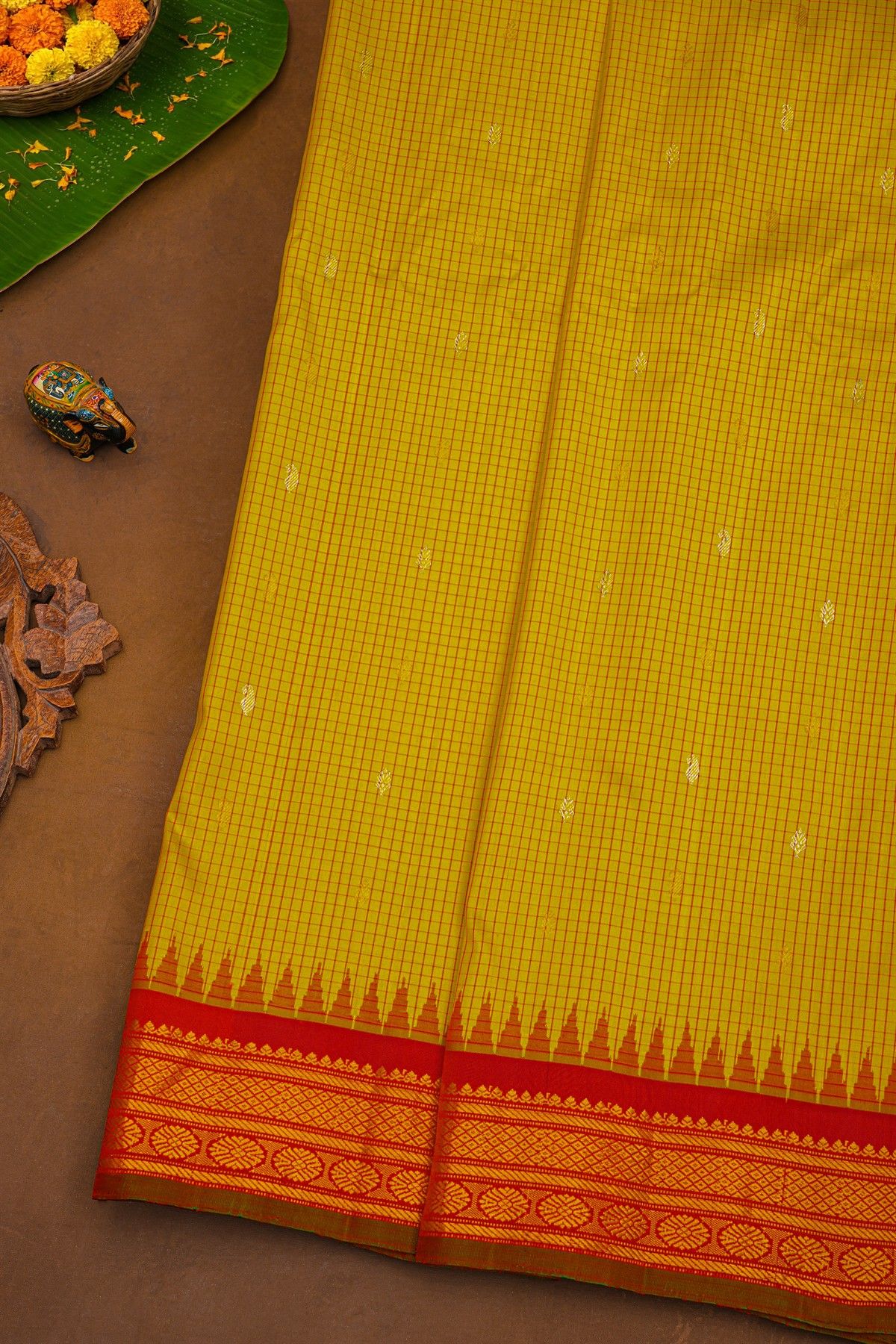 Gadwal Silk Yellow Saree With Diamonds And Florals With Temples Border