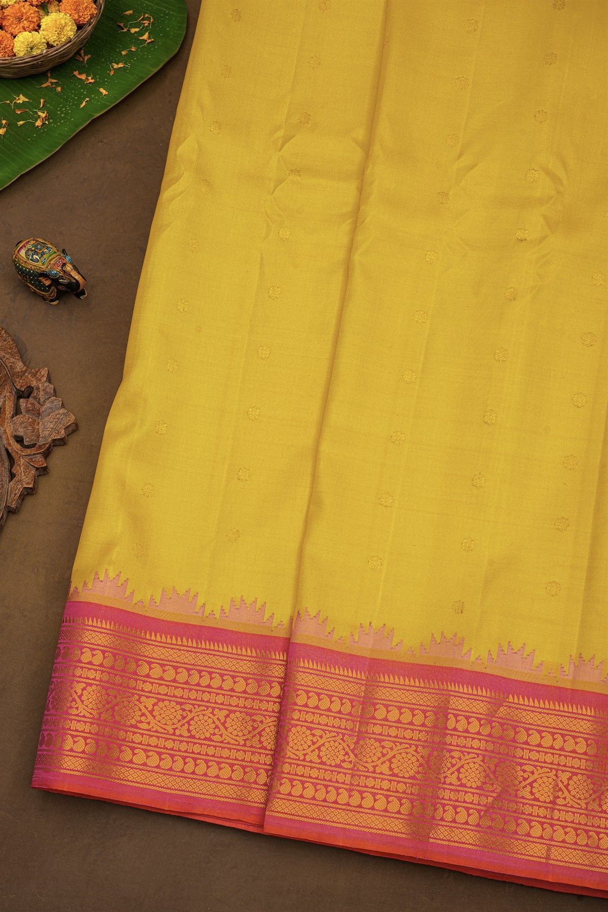 Gadwal Silk Yellow Saree With Buttis Body And Florals And Mango Paisleys Contrast Border