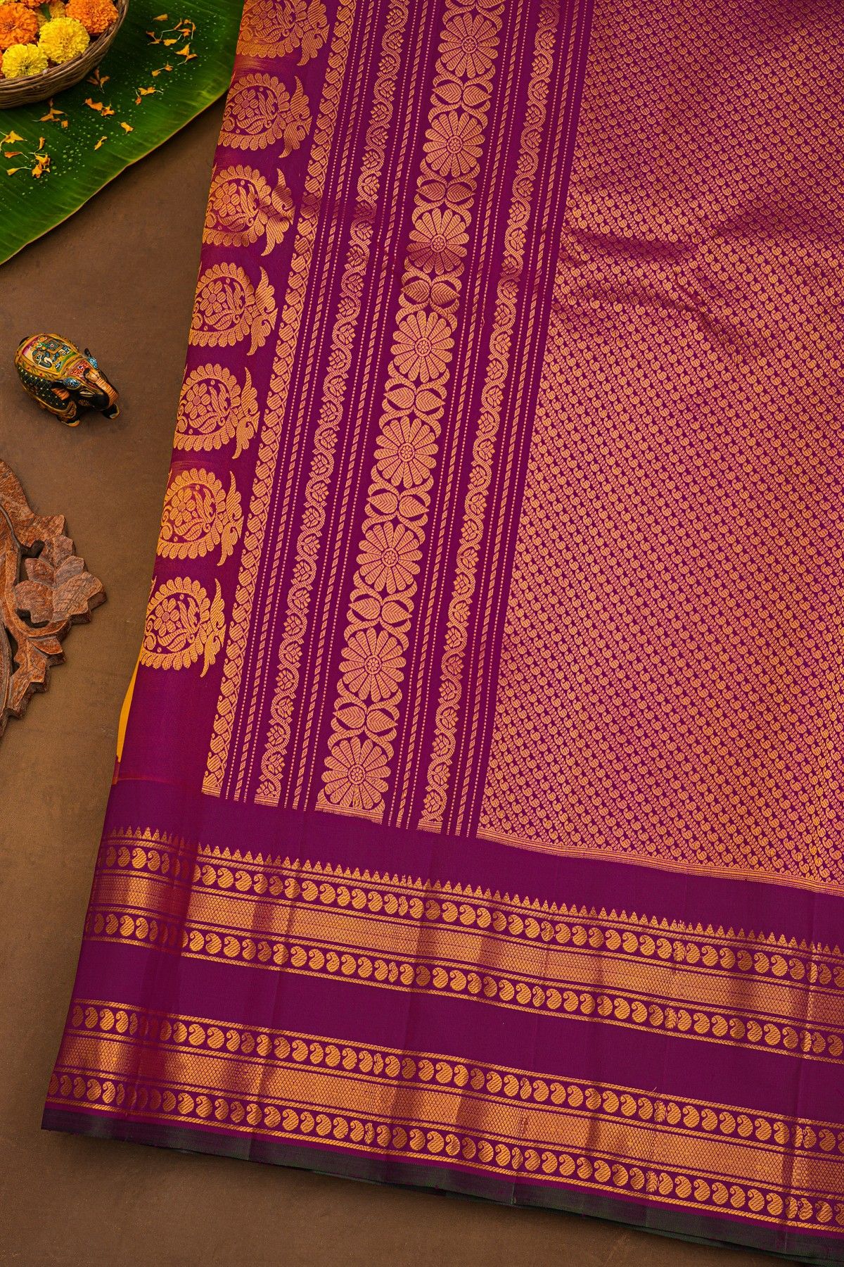 Gadwal Silk Yellow Saree With Buttis Body And Contrast Mango Paisley Border