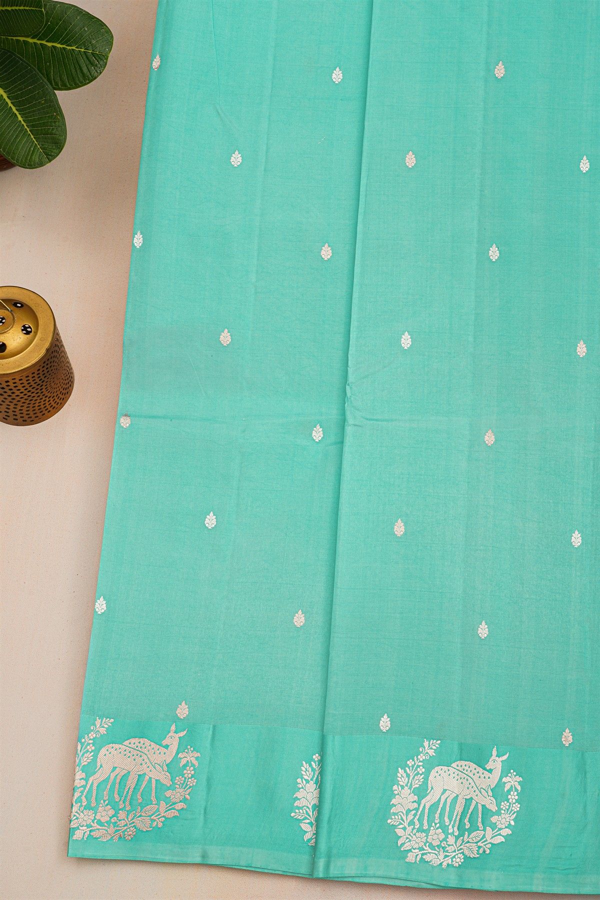 Fancy Matka Silk Sky Blue Saree With Florals And Buttis Body And Self Florals With Deers Border