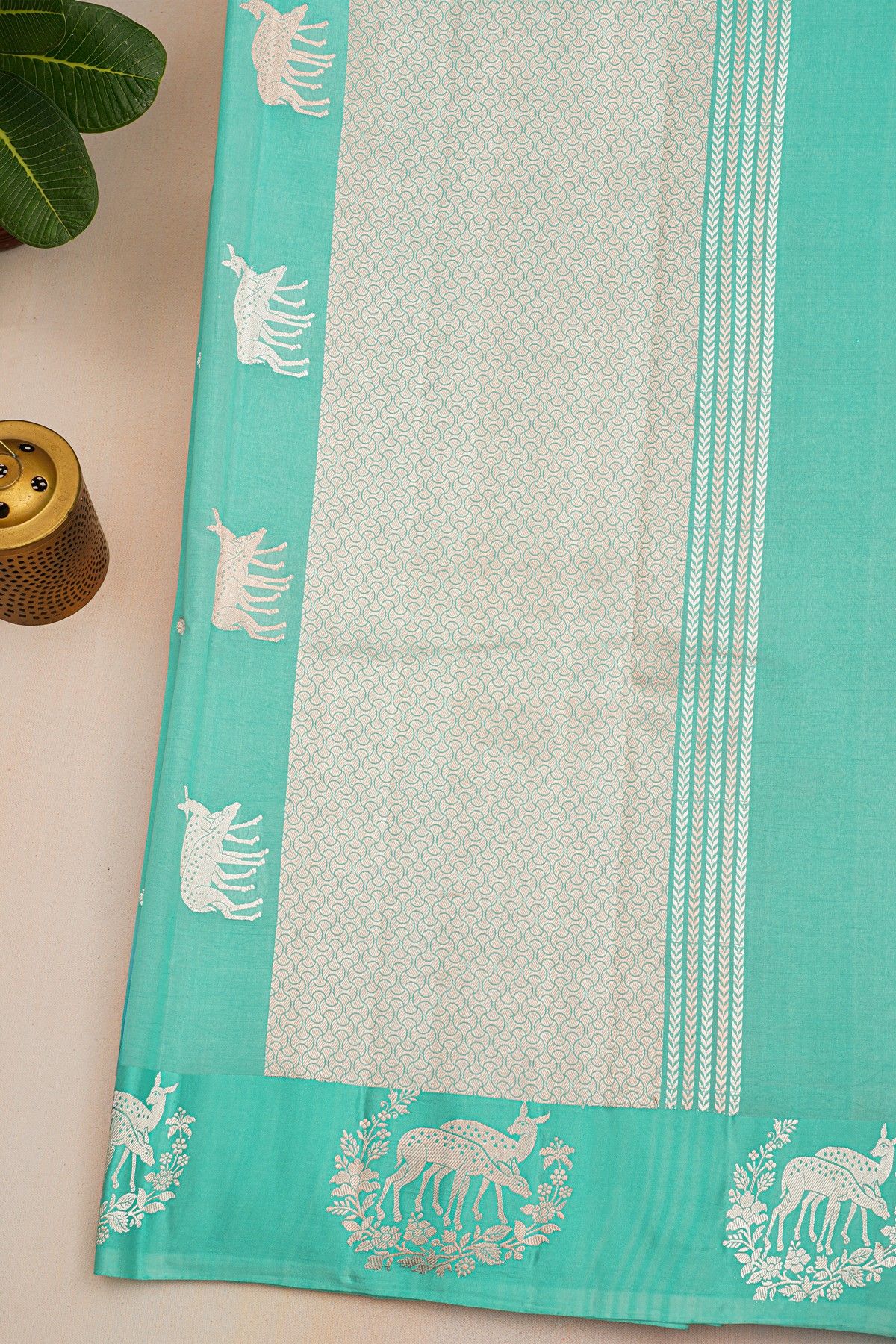 Fancy Matka Silk Sky Blue Saree With Florals And Buttis Body And Self Florals With Deers Border