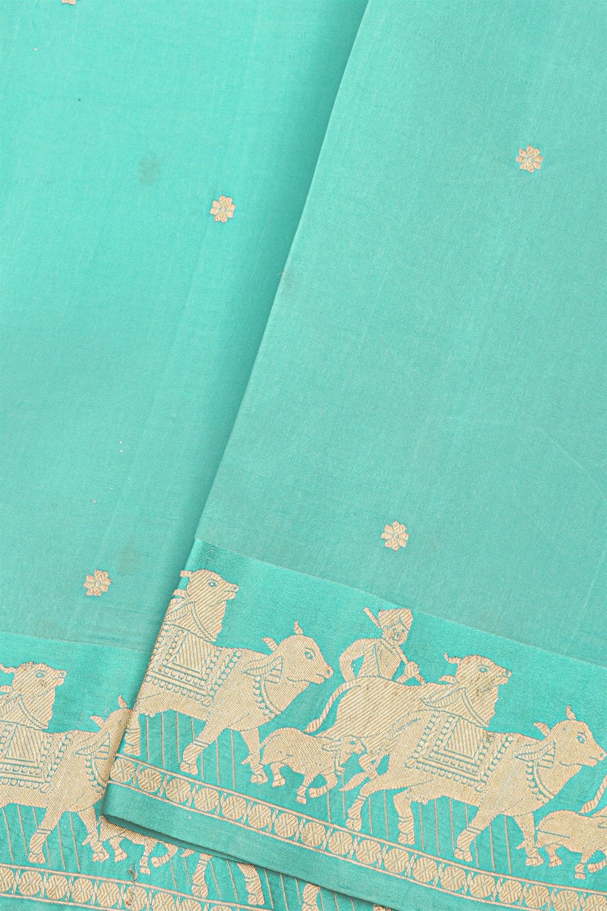 Fancy Matka Silk Sky Blue Saree With Floral Buttis Body And Pichwai Cows Motifs Border