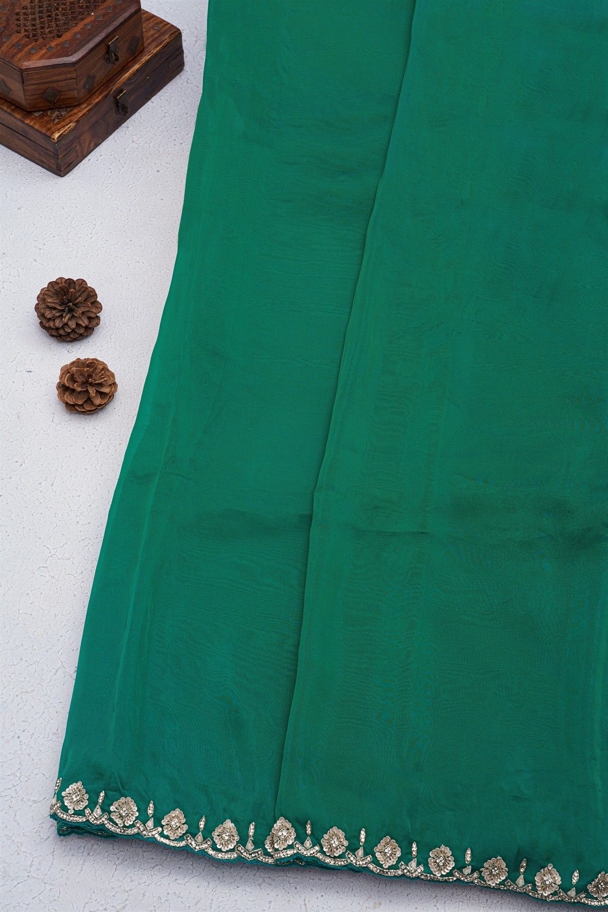 Banarasi Georgette Bottle Green Saree With Florals And Leaves Border