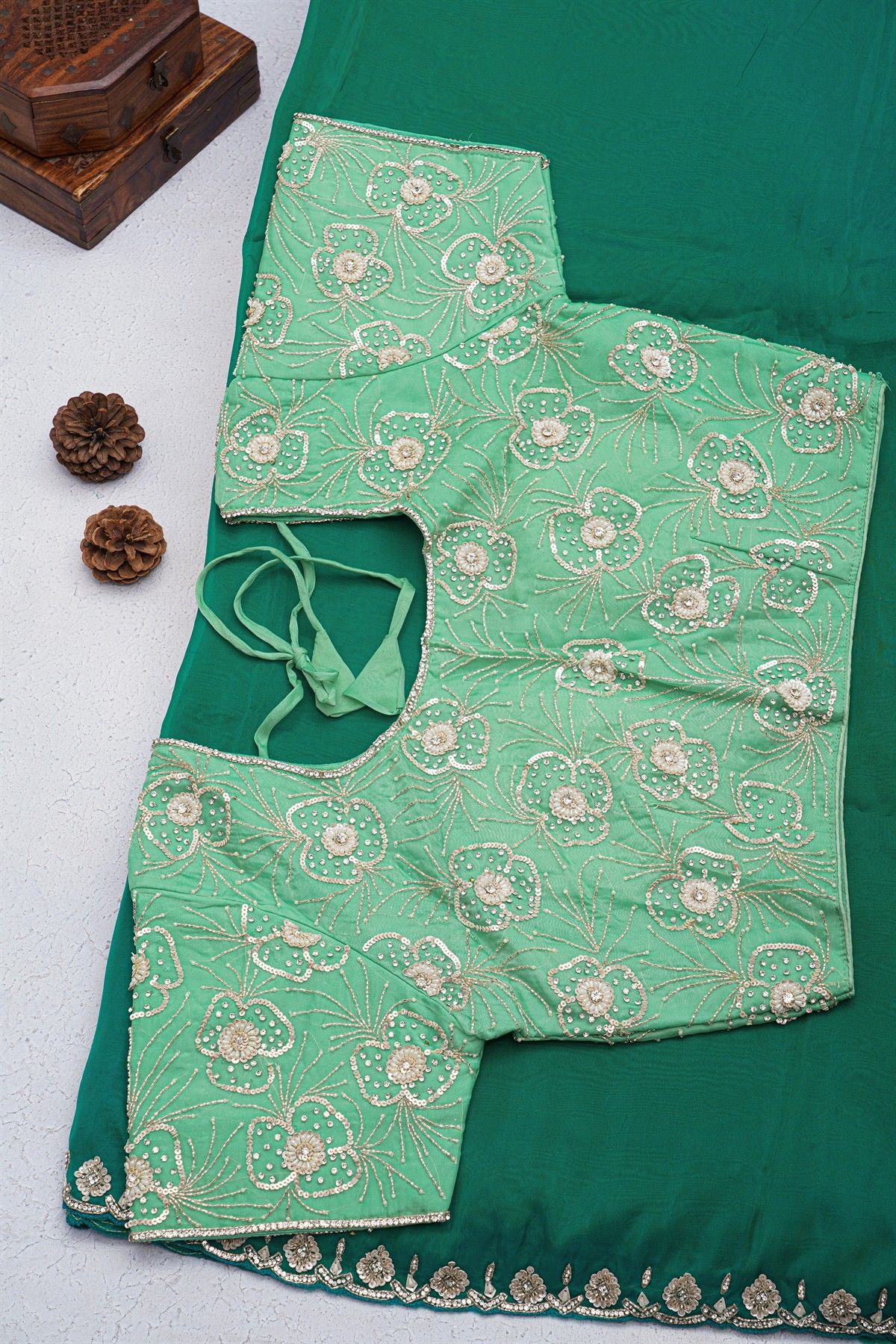 Banarasi Georgette Bottle Green Saree With Florals And Leaves Border