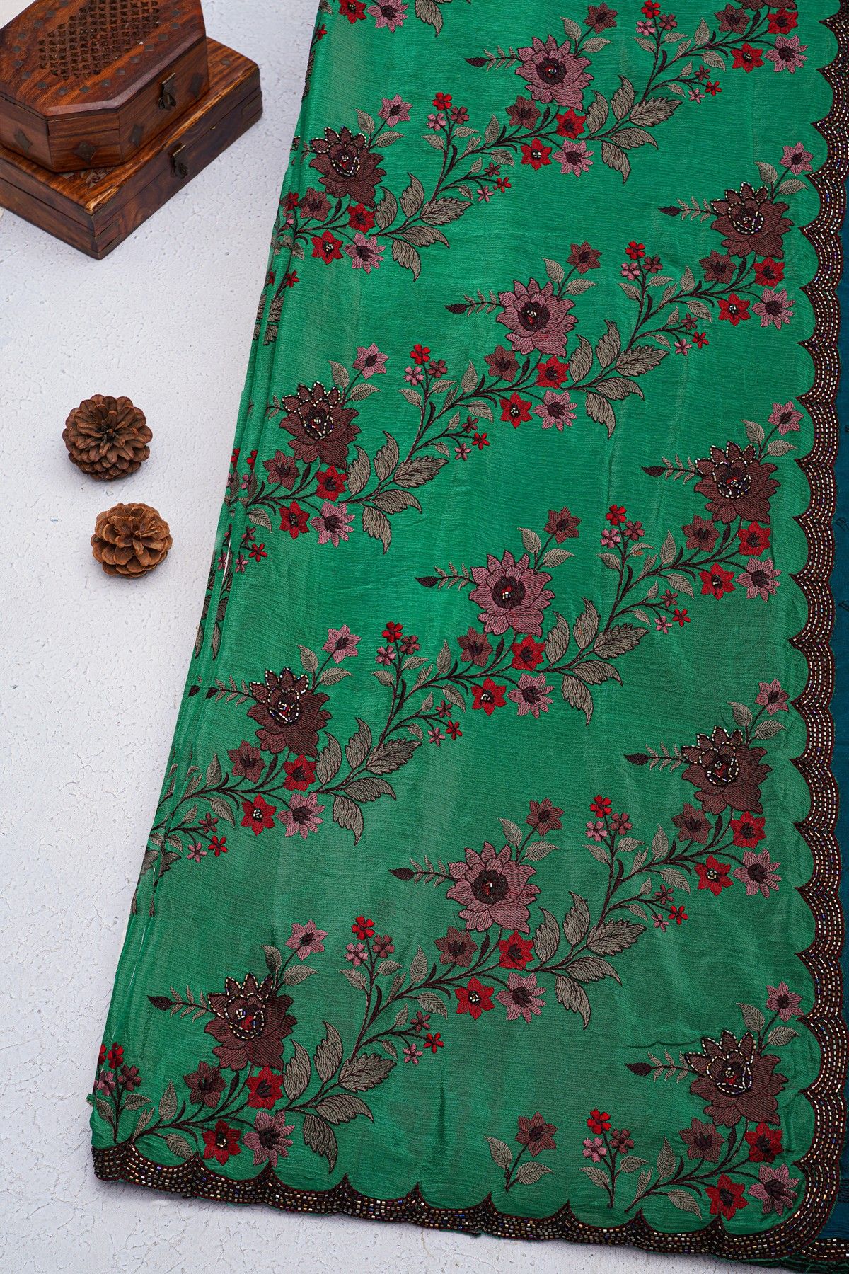 Fancy Georgette Peacock Green Saree With Weaves Design In Kardana Work Border